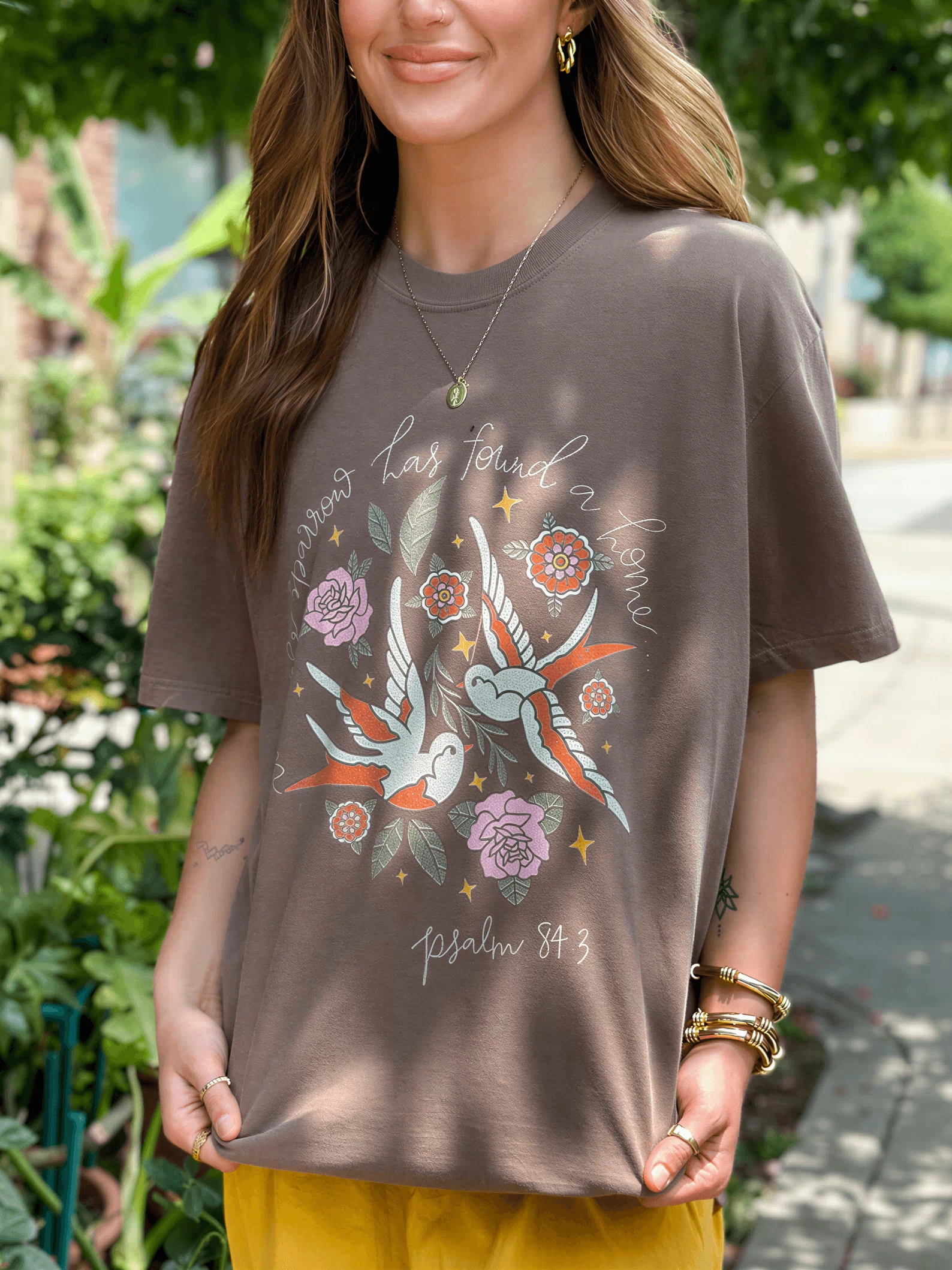 model wearing Even The Sparrow Tee
