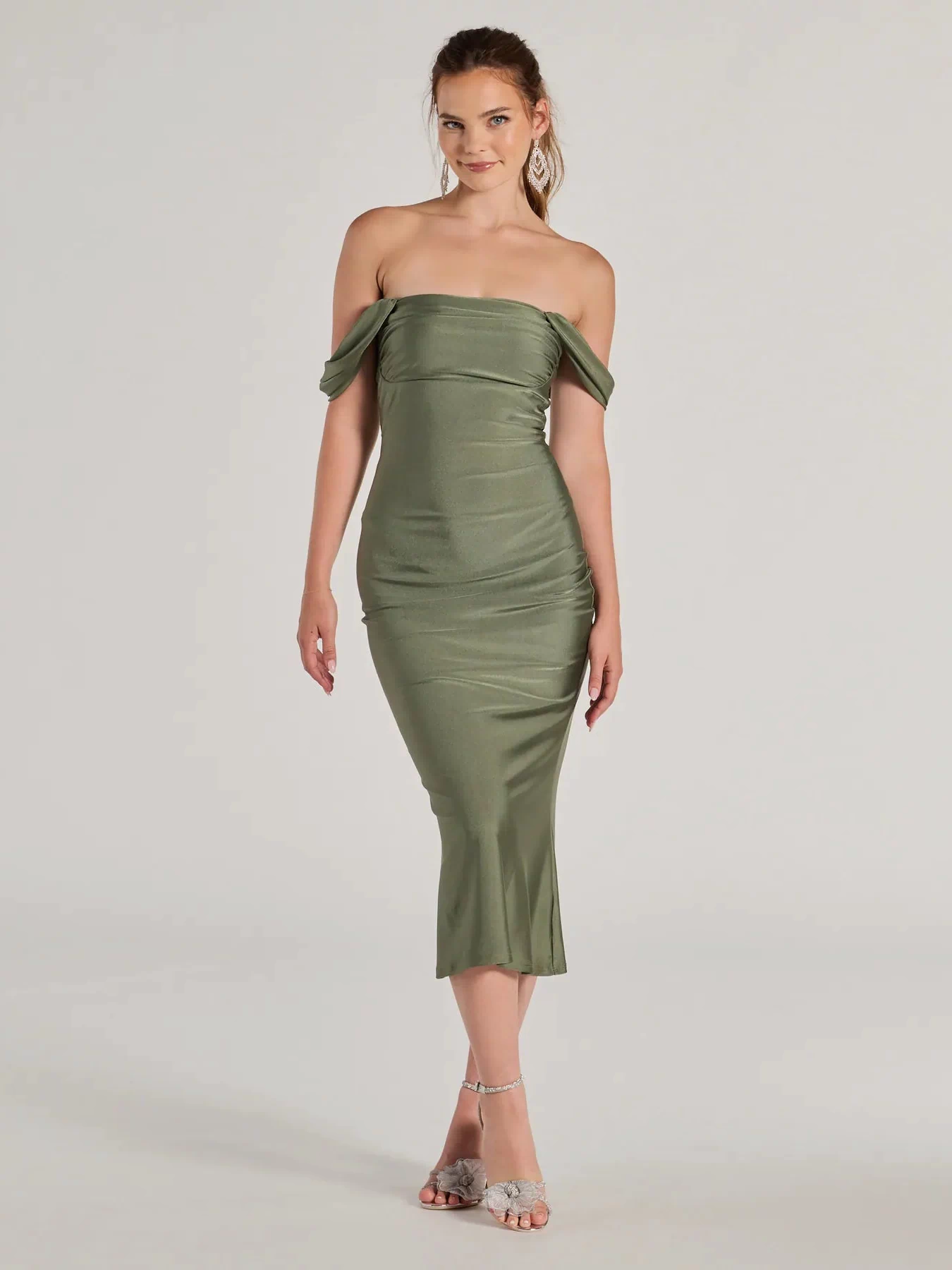 Make the big day unforgettable with the Exceptional Off-The-Shoulder Flared Midi Dress, a gorgeous sage green bridesmaid dress that balances elegance and affordability.