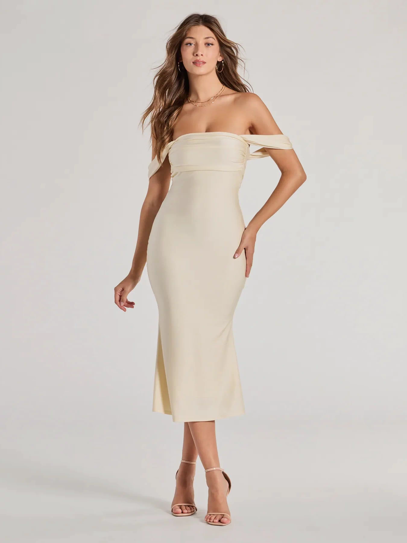 Make the big day unforgettable with the Exceptional Off-The-Shoulder Flared Midi Dress, a gorgeous natural bridesmaid dress that balances elegance and affordability.