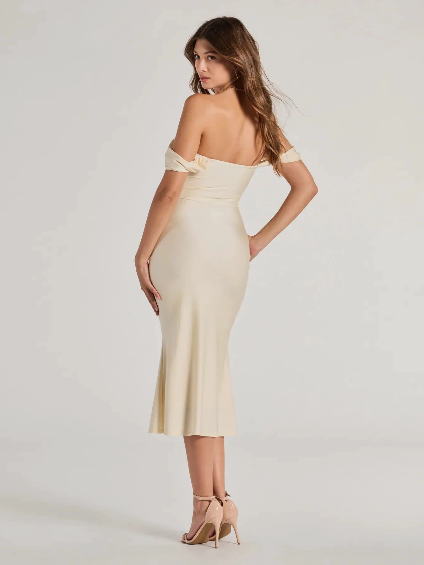 Feel instantly put-together in the Exceptional Off-The-Shoulder Flared Midi Dress in natural, a wedding guest dress designed for confident style and all-out celebration.