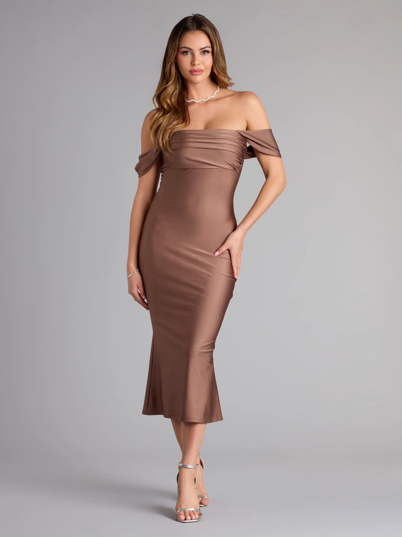 The Exceptional Off-The-Shoulder Flared Midi Dress is your new go-to Windsor dress—effortless, versatile, and made to update your spring or summer style in seconds.