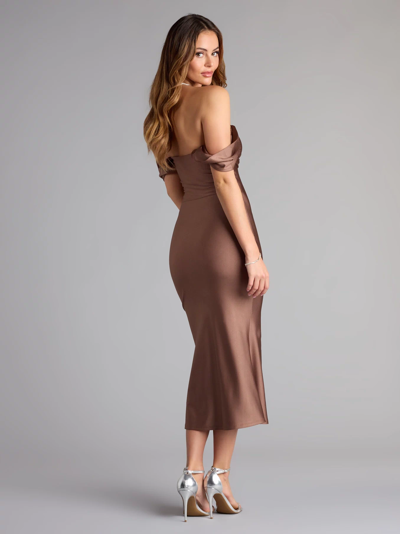Feel ready for every dance floor moment or feed-worthy reel in the Exceptional Off-The-Shoulder Flared Midi Dress, a homecoming dress designed to own your moment.