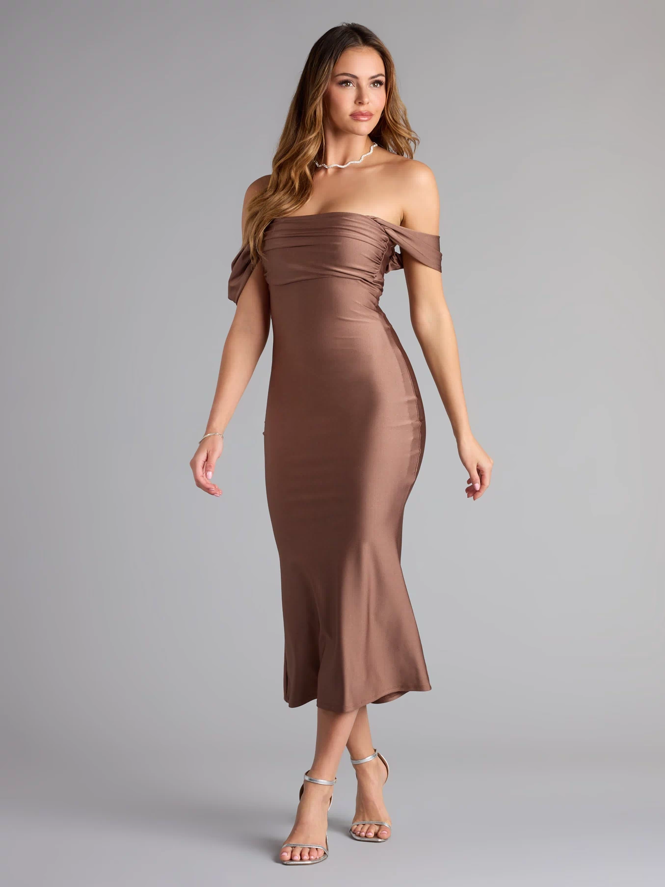 The Exceptional Off-The-Shoulder Flared Midi Dress is your new go-to Windsor dress—effortless, versatile, and made to update your spring or summer style in seconds.
