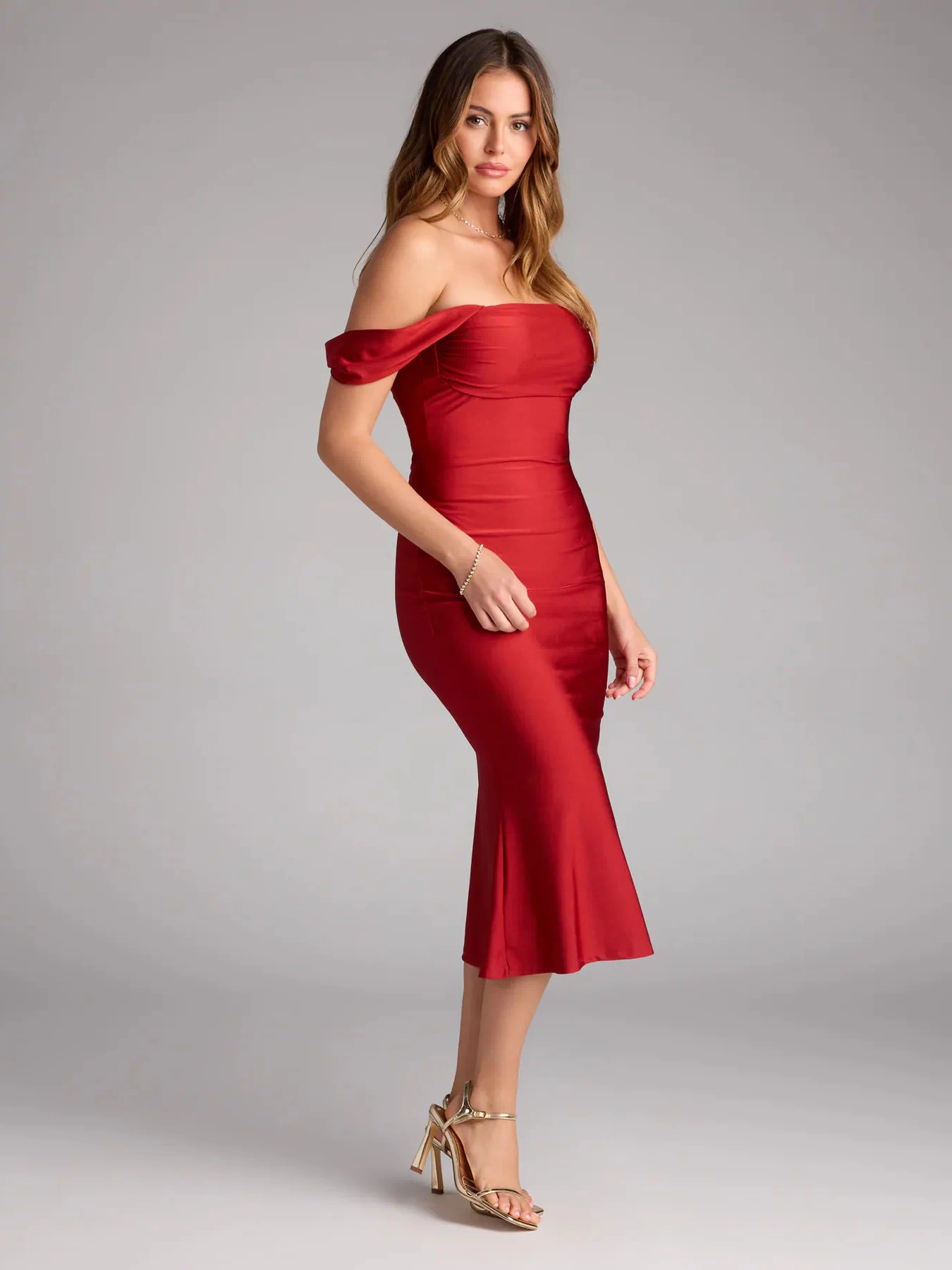 The Exceptional Off-The-Shoulder Flared Midi Dress is your new go-to rust dress—effortless, versatile, and made to update your spring or summer style in seconds.