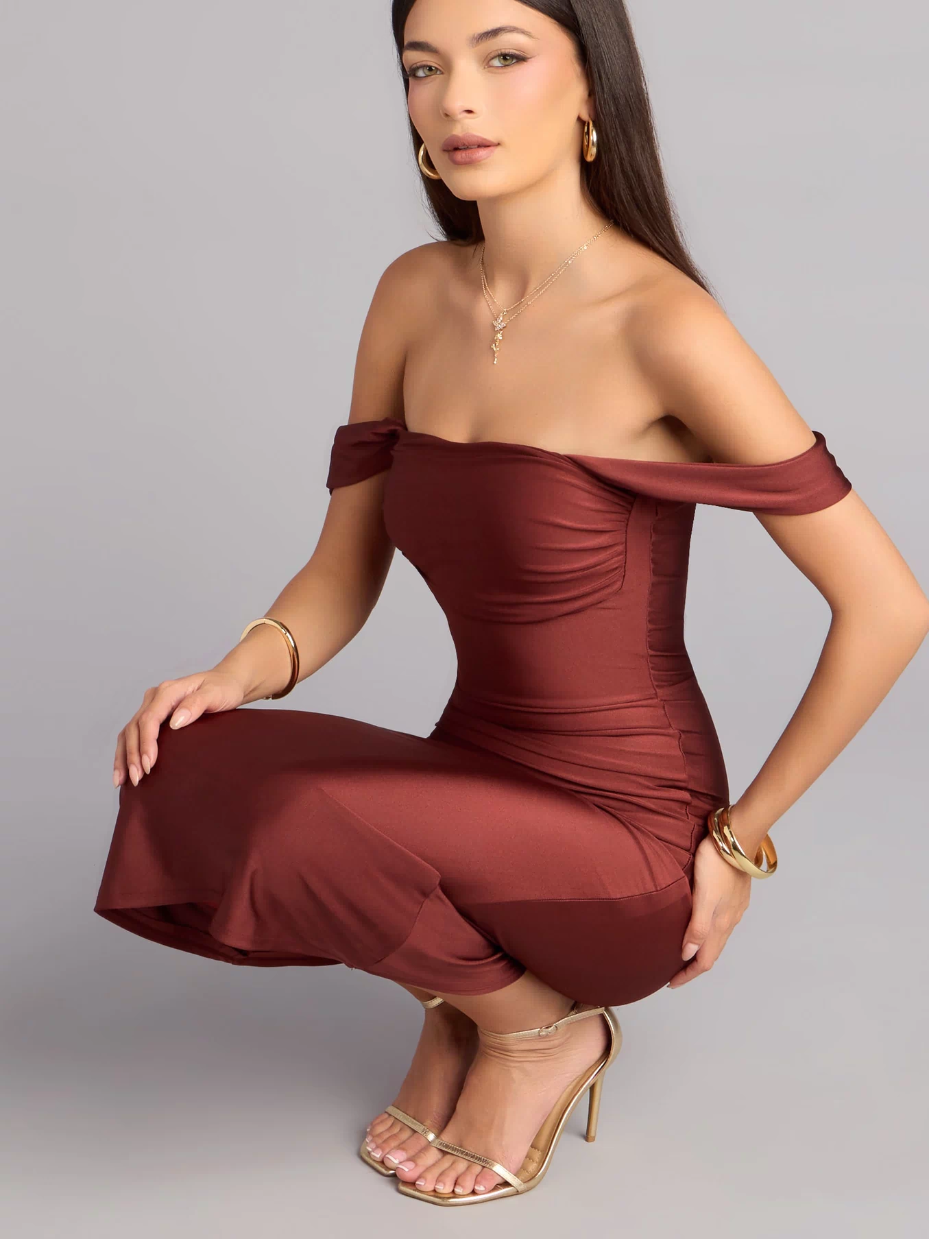 Elevate your look with a midi dress like the Exceptional Off-The-Shoulder Flared Midi Dress in brown, featuring a flattering mid-length silhouette and effortless, polished style.