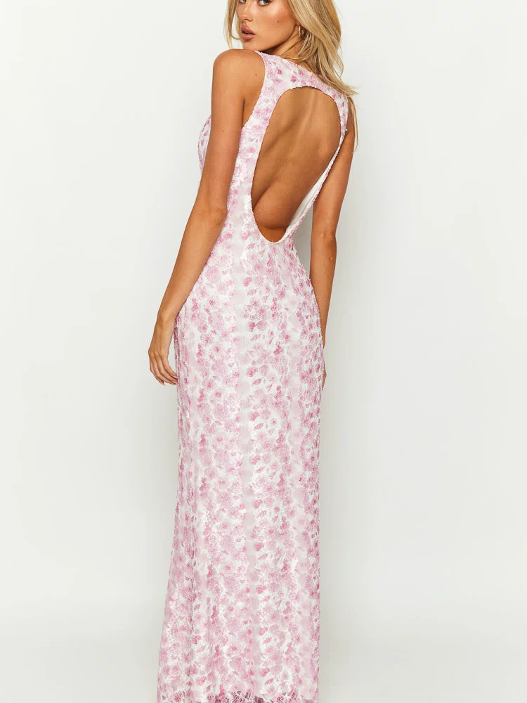 Rear view of a pink lace maxi dress with a deep scoop back and heart-shaped cutout