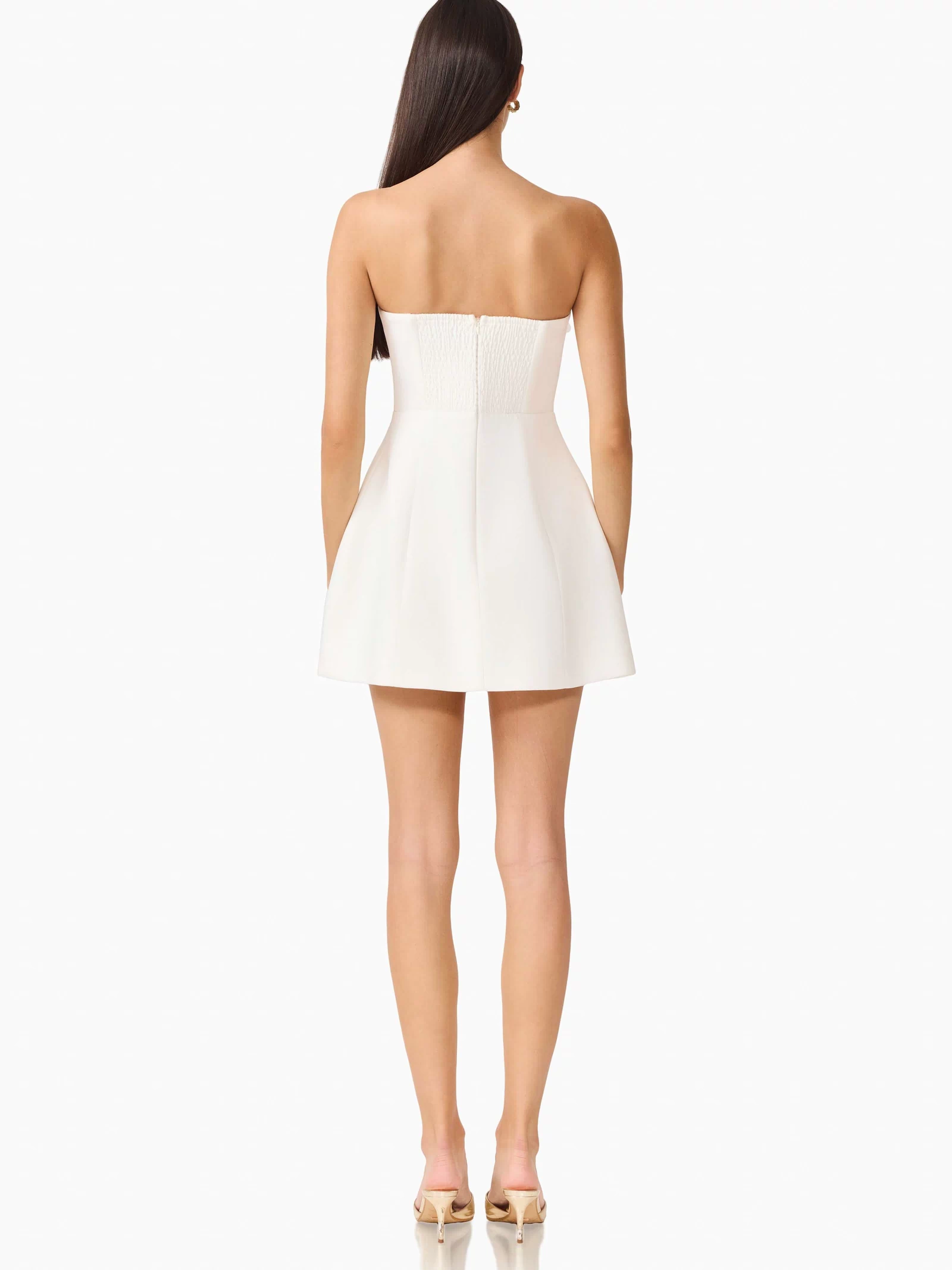 Gemma Floral Mini Dress in White with a tulip skirt & zipper back, back shot 