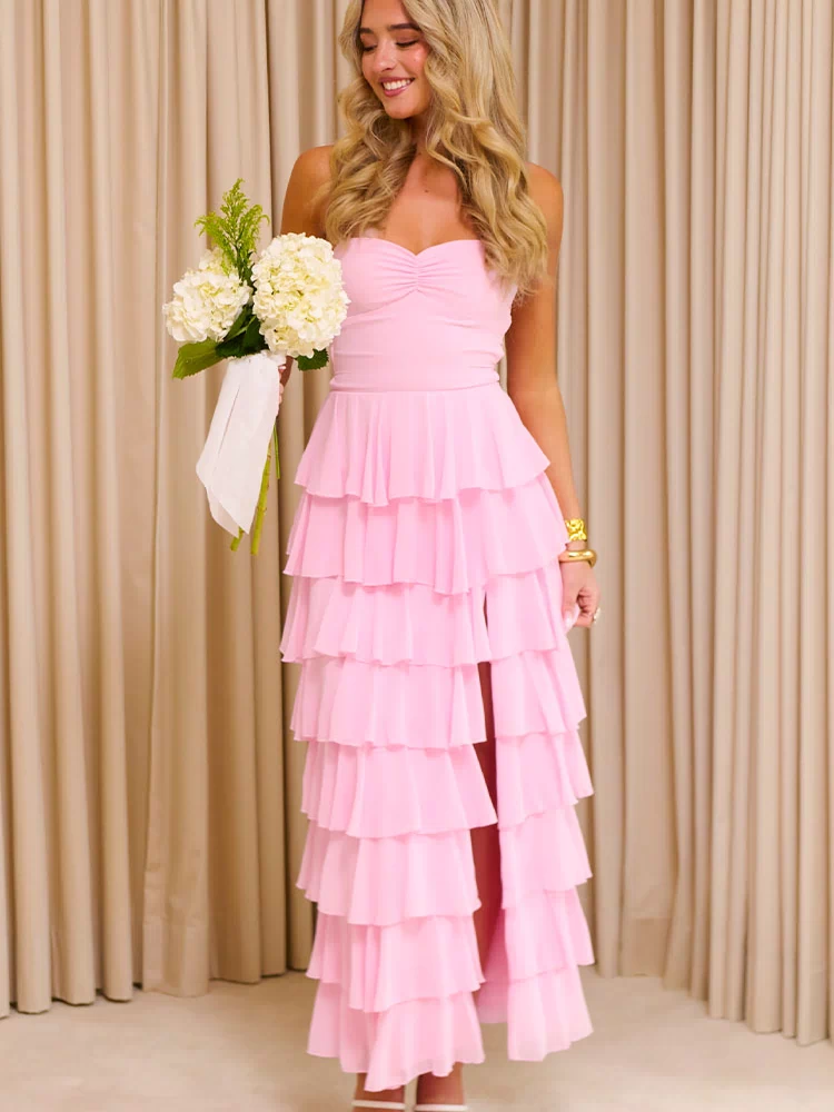 Two pink ruffle maxi dresses, one halter neck with full tiered skirt, one sweetheart neckline with high-low hem
