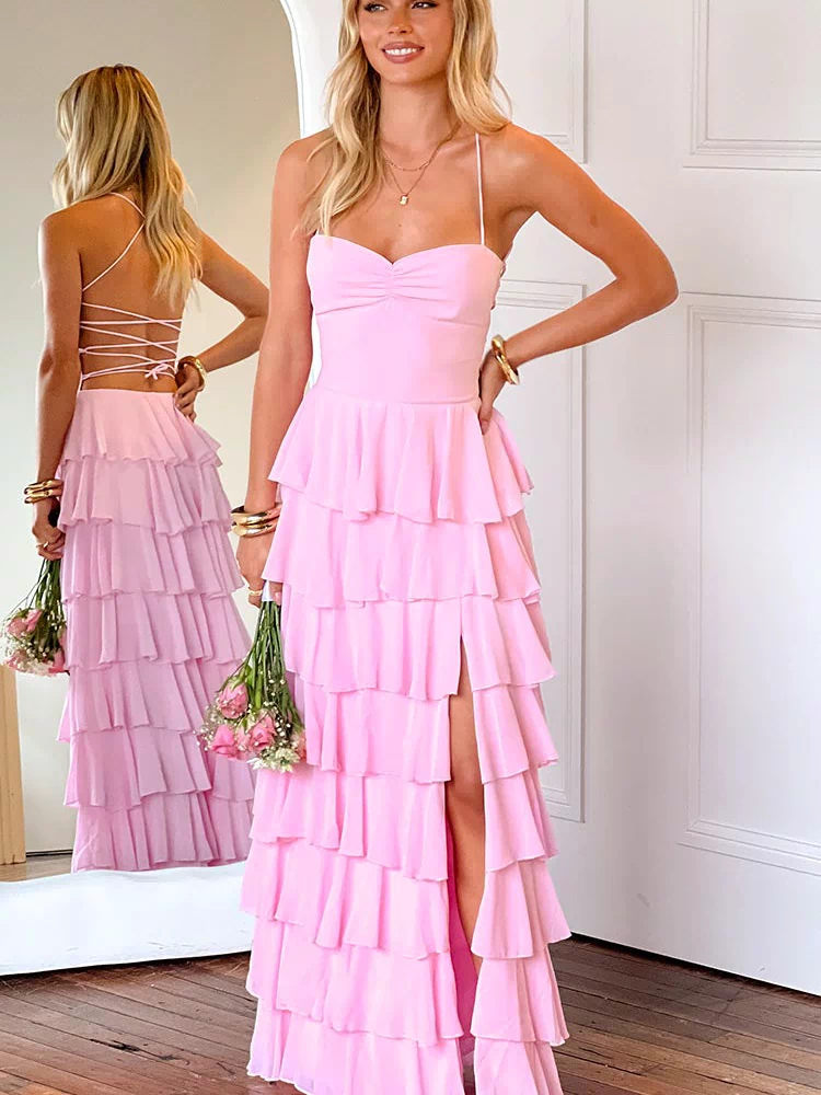 Pink tiered ruffle maxi dress with a sweetheart neckline, ruched bust, high leg slit, and a lace-up back detail