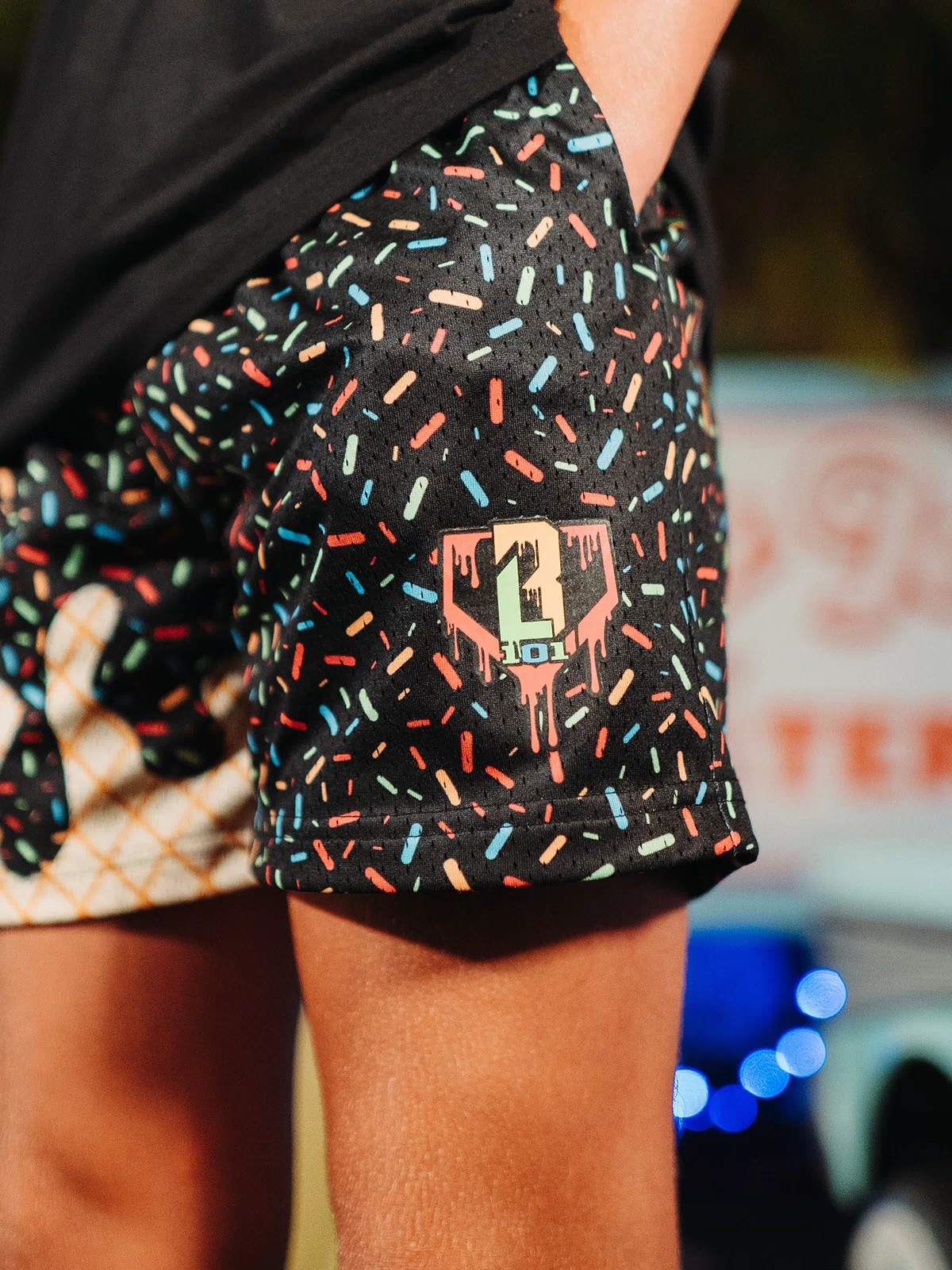 Youth model wearing black Ice Cream Midnight Sundae youth shorts
