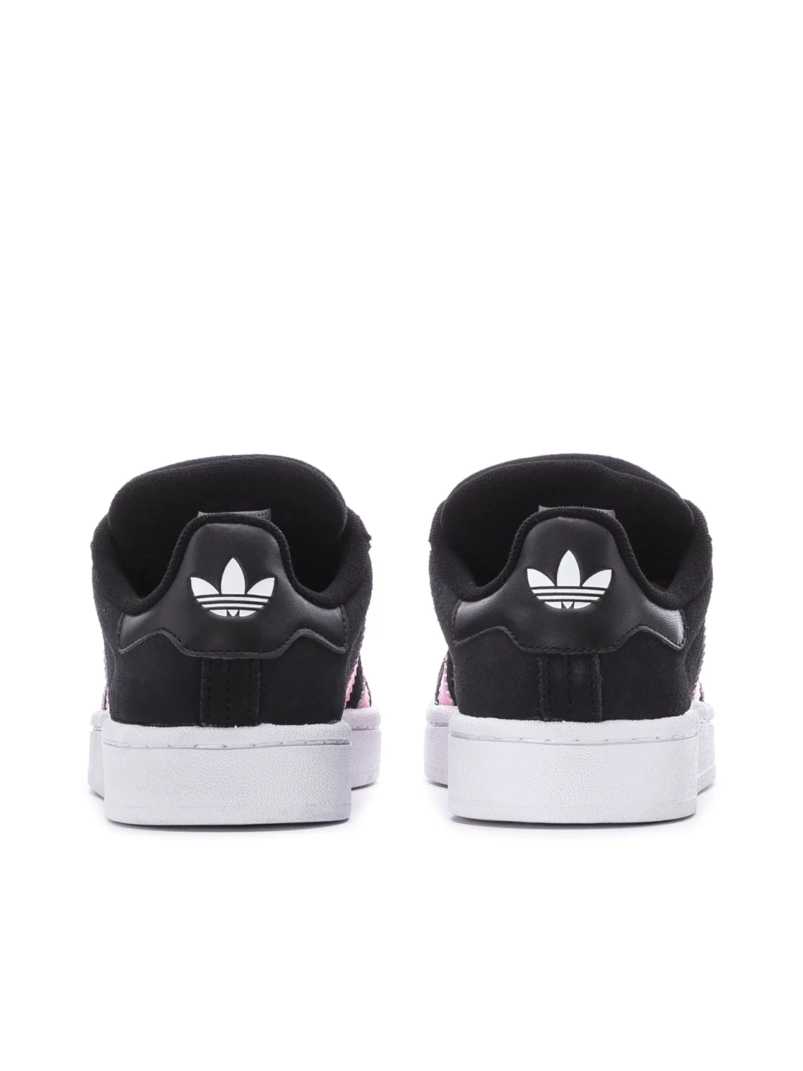 Back view of black low-top sneakers with white sole and pink stripe heel detail.