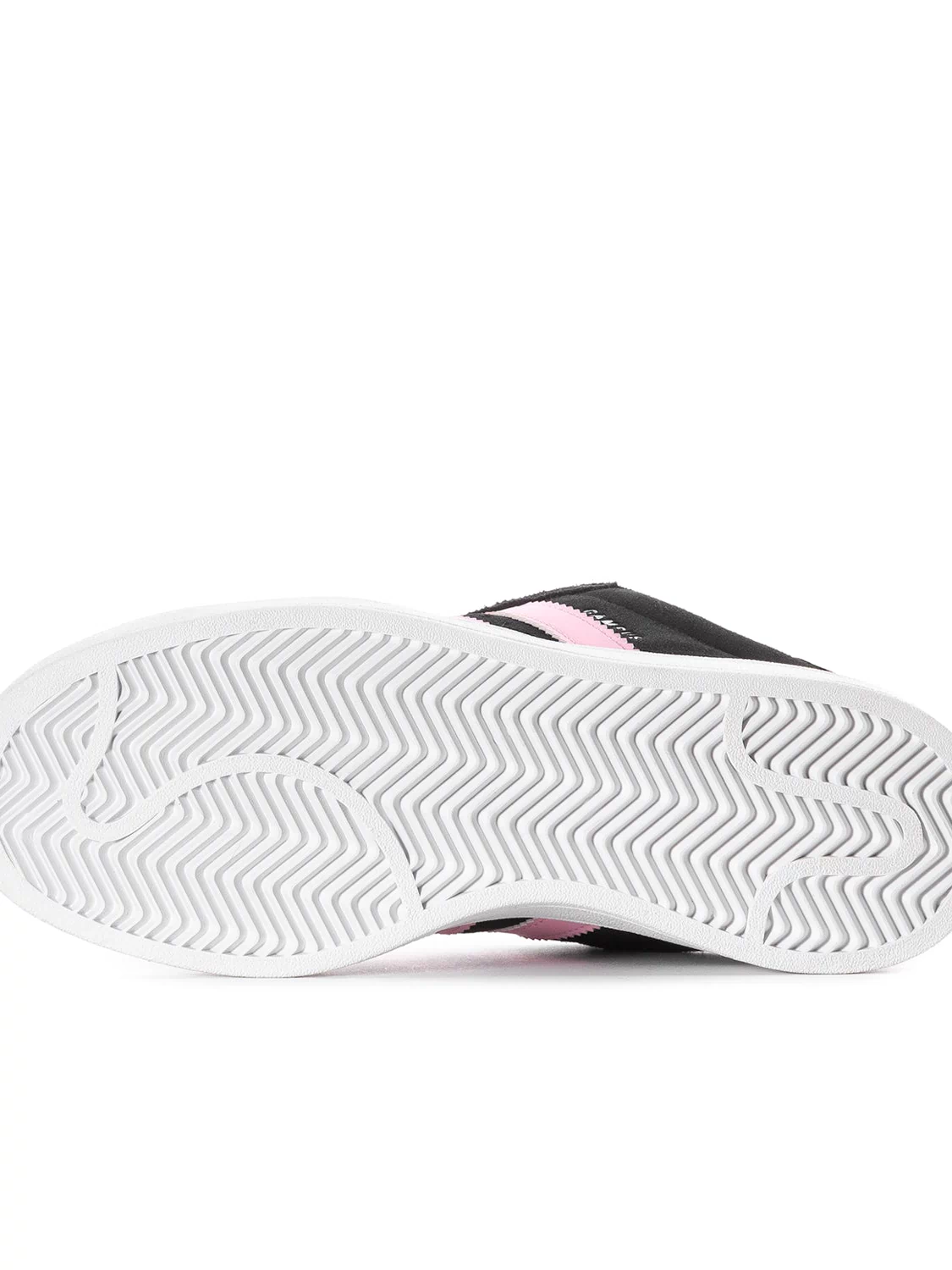 Black sneaker outsole with white rubber tread and pink stripe edge detail.