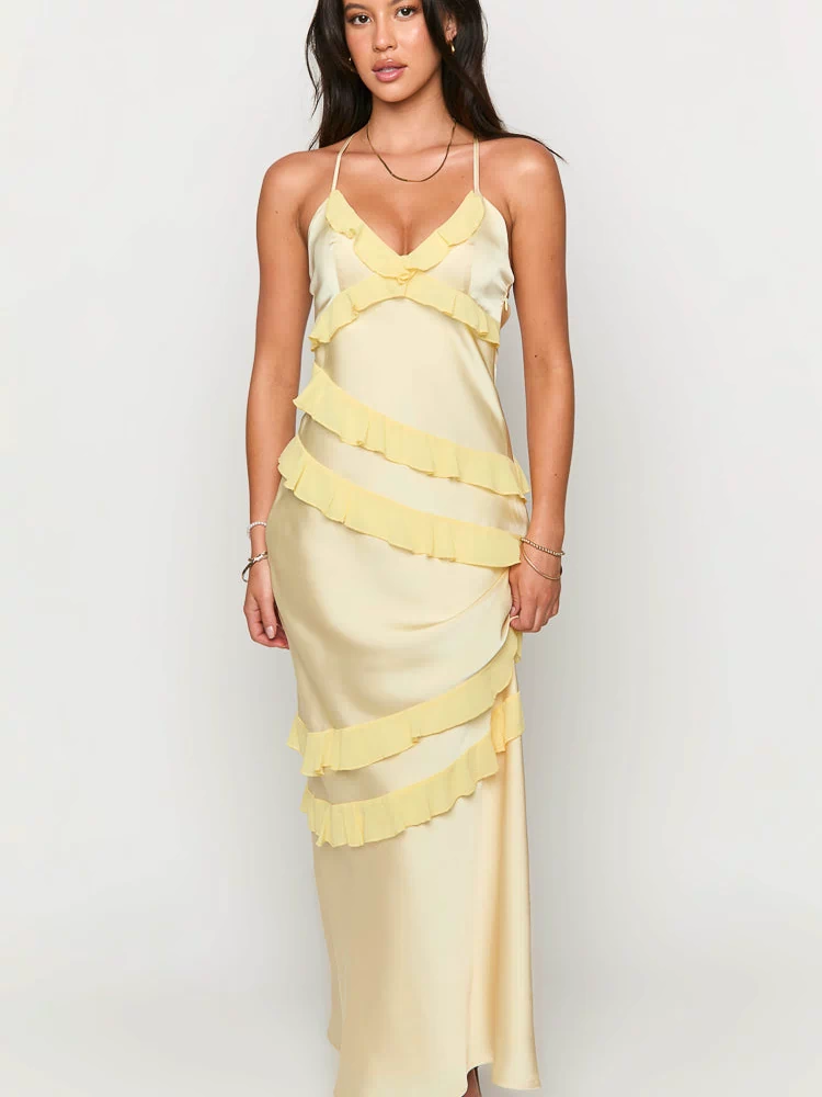 Front view of a pale yellow satin maxi dress with a V-neck and brighter yellow tiered ruffles