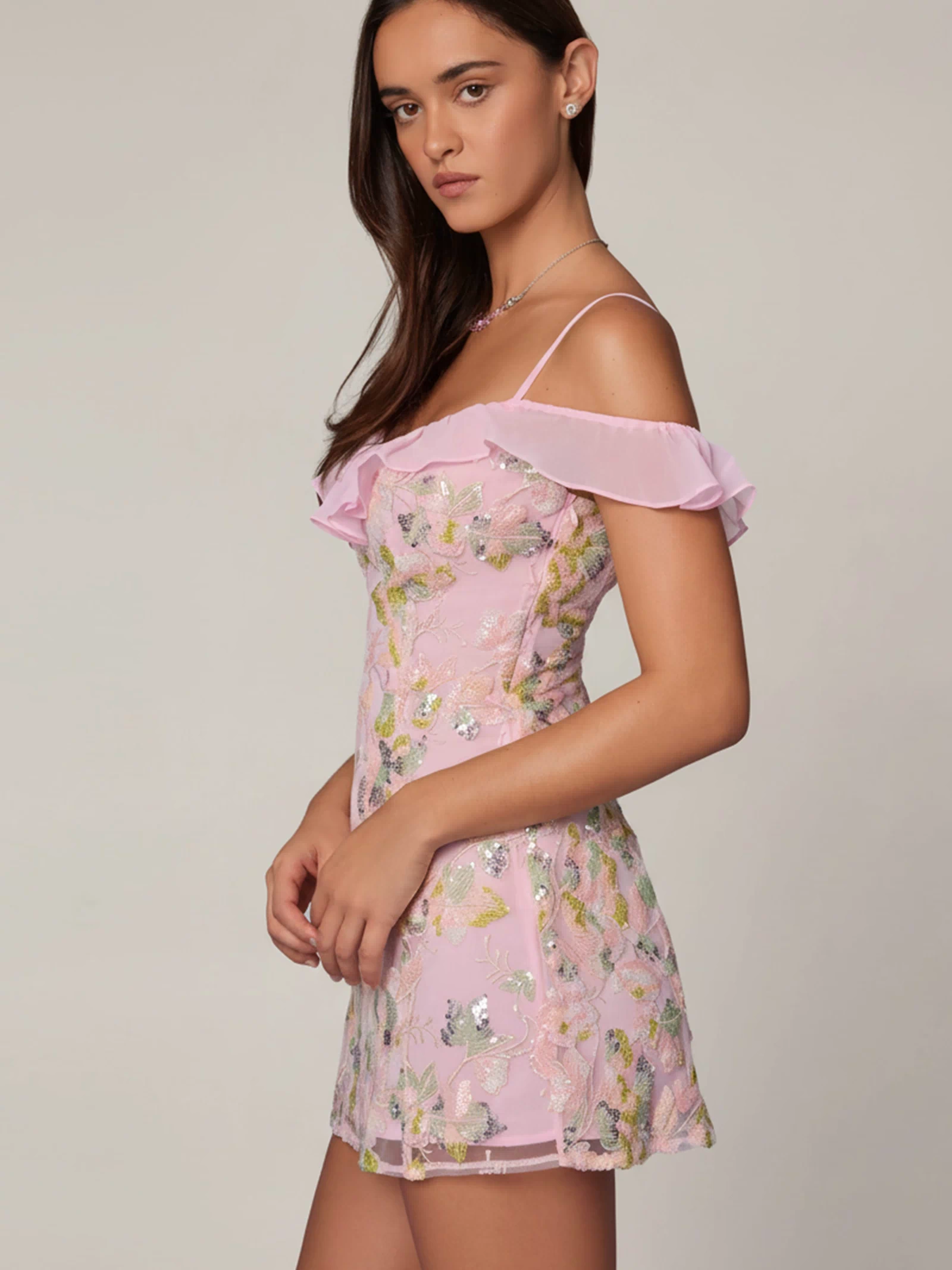 Oh Polly model Roberta wearing the Jacira Mini Dress in Ballet Pink Sequin, Chiffon fabric perfect for date night glam