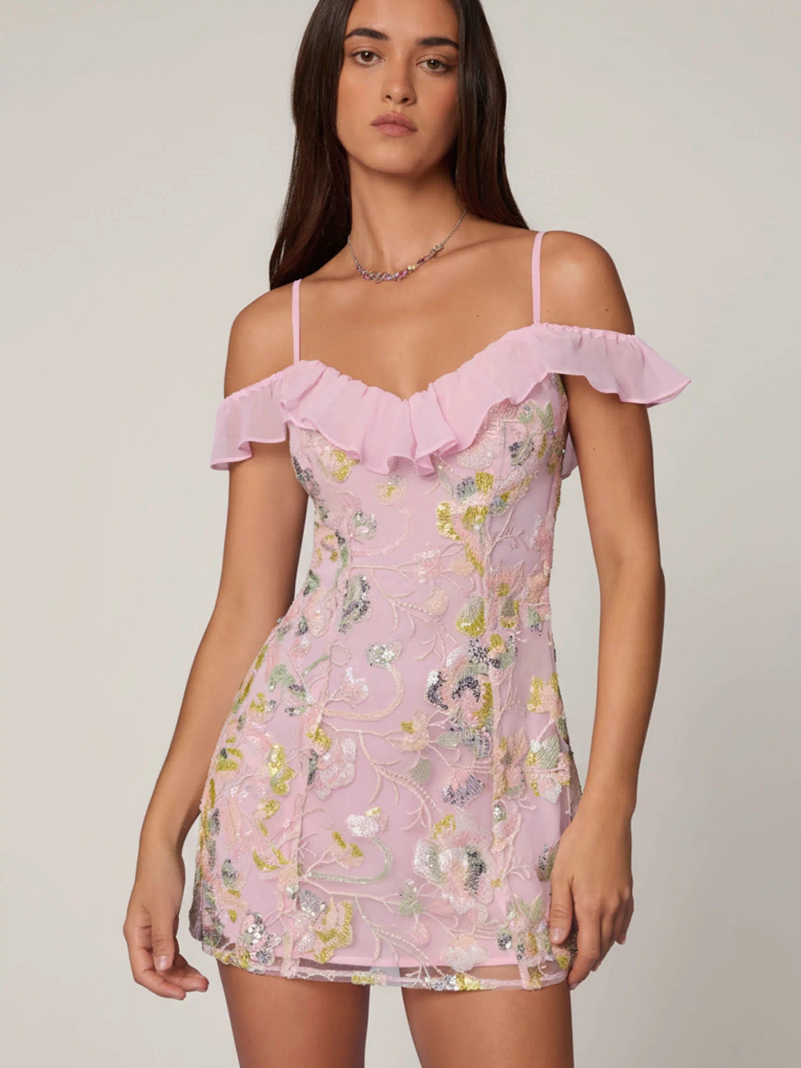 Oh Polly model Roberta wearing the Jacira Mini Dress in Ballet Pink Sequin, Chiffon fabric perfect for girls’ night out
