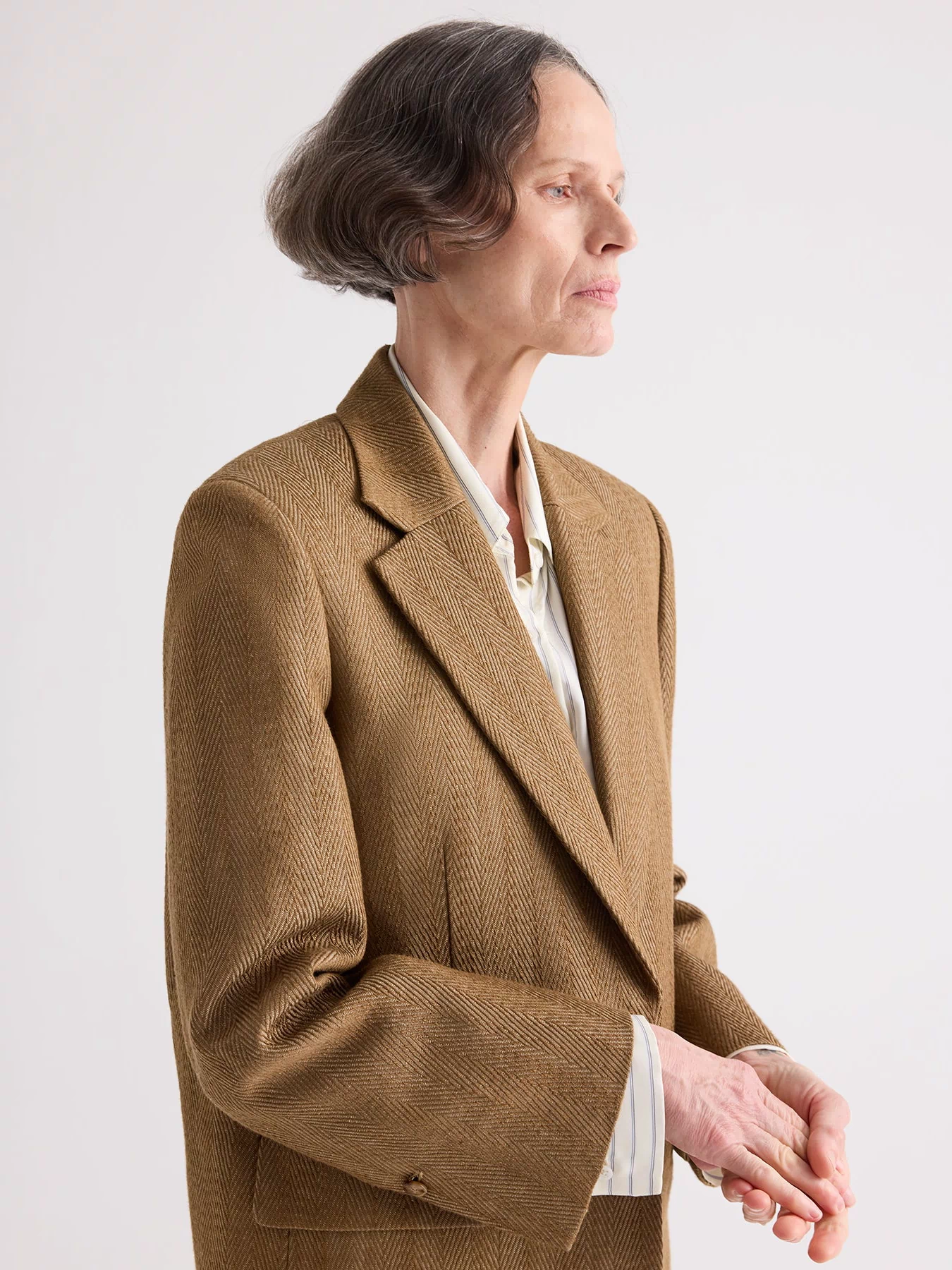 Kelp Herringbone Linen Blazer Notched Lapel - Side Profile On Model | TWP Clothing