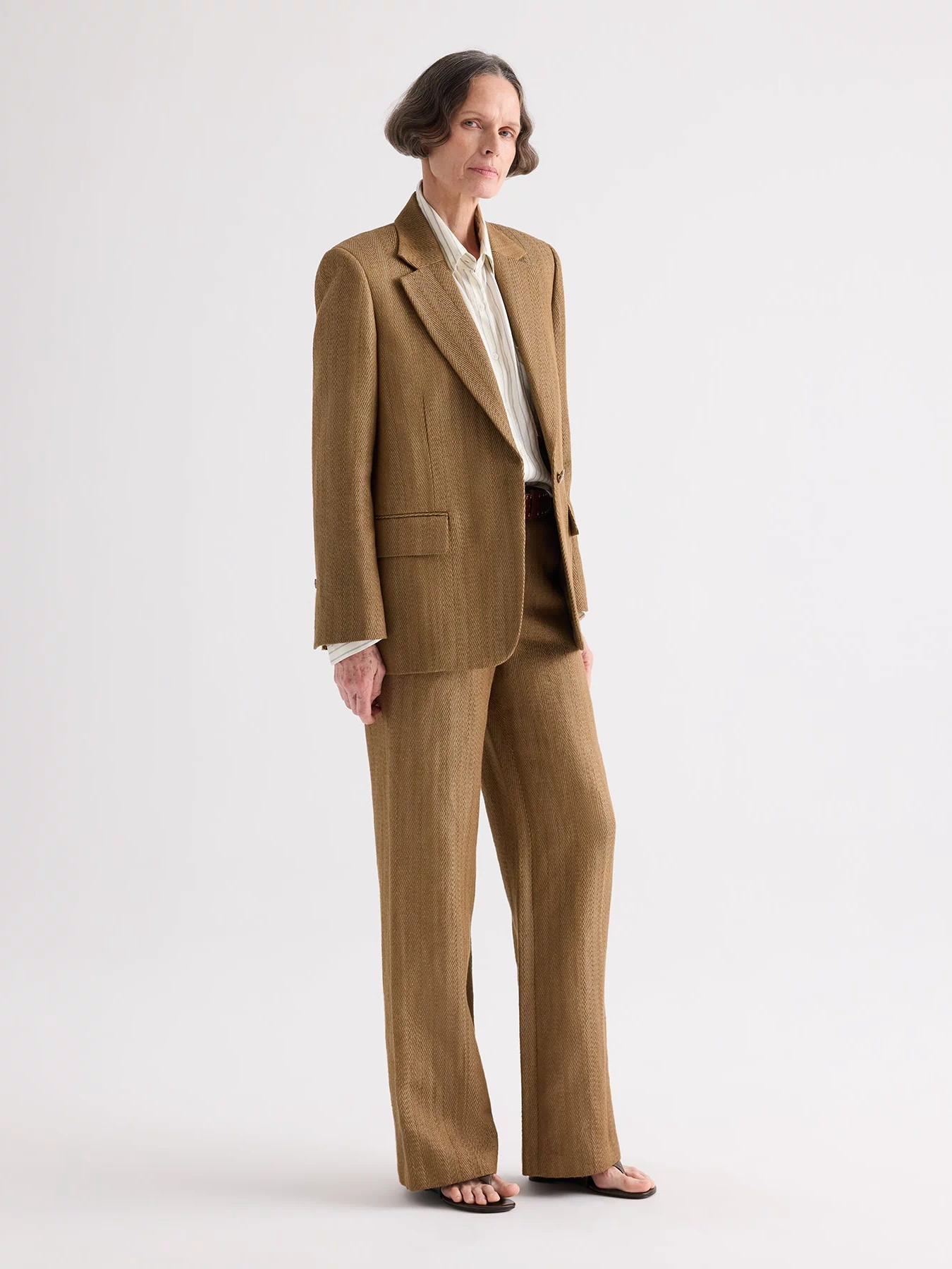 Kelp Herringbone Linen Blazer Back Vent Detail - Full Length On Model | TWP Clothing
