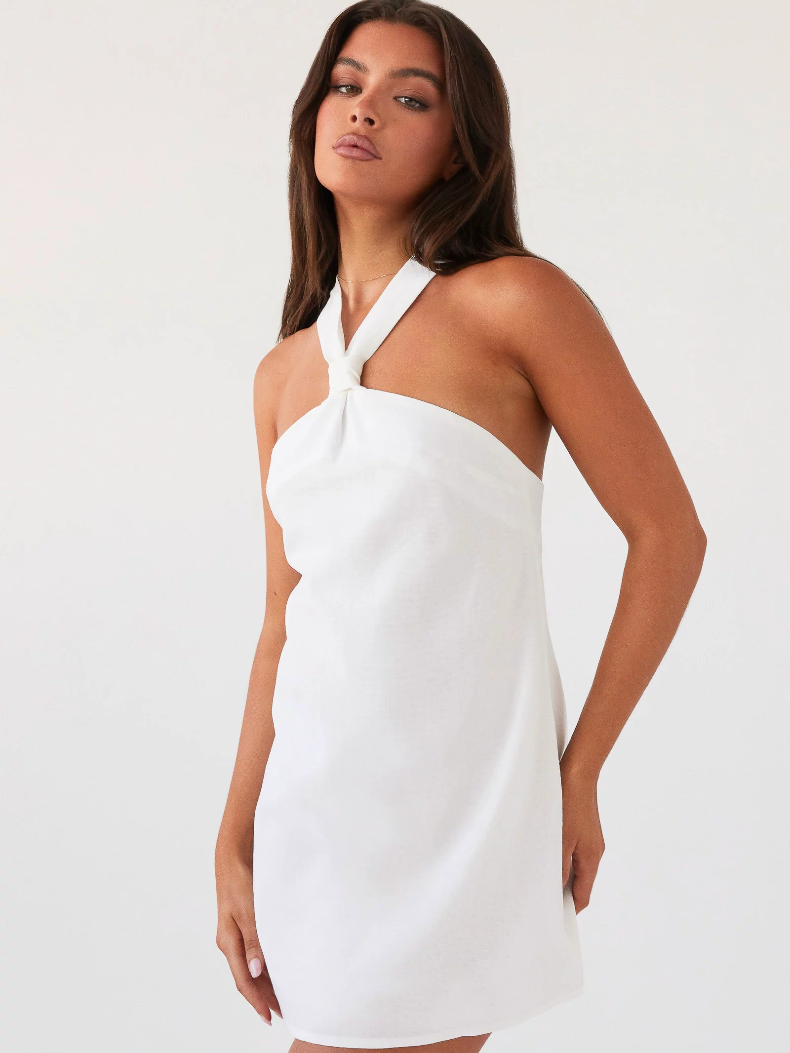 Womens Keira Linen Mini Dress in the colour White in front of a light grey background