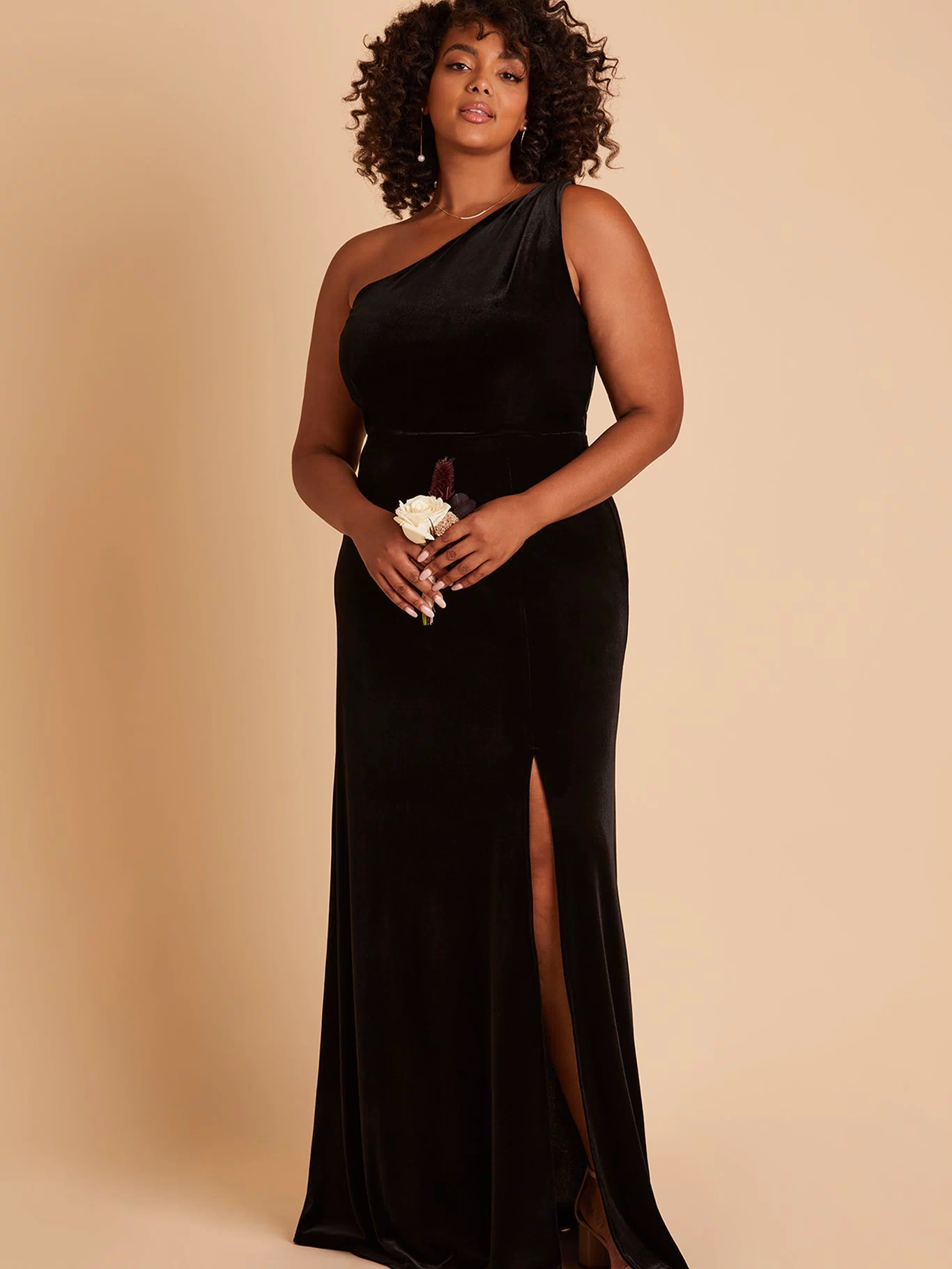 Kira plus size bridesmaid dress with slit in black velvet by Birdy Grey, front view