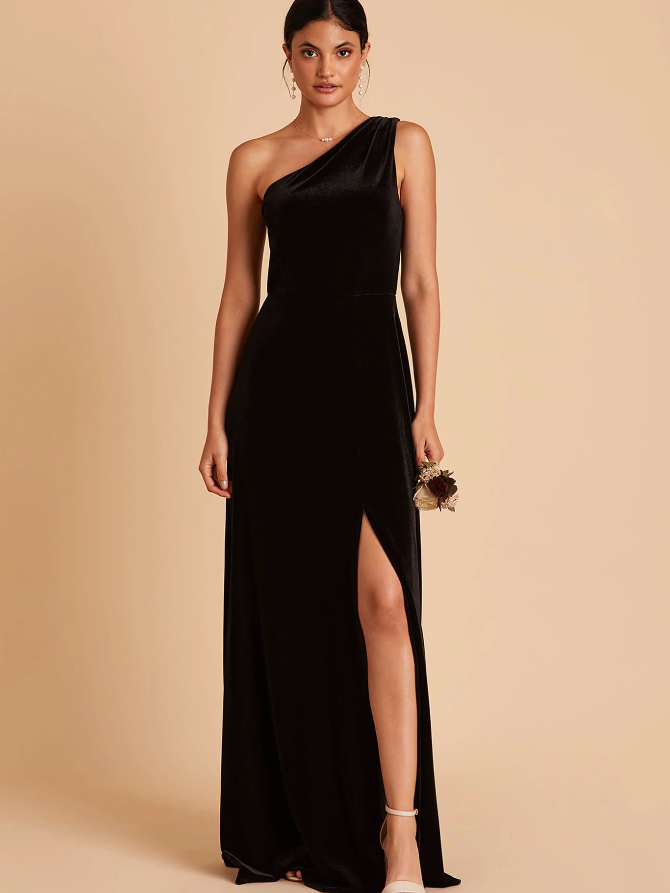 Kira bridesmaid dress with slit in black velvet by Birdy Grey, front view