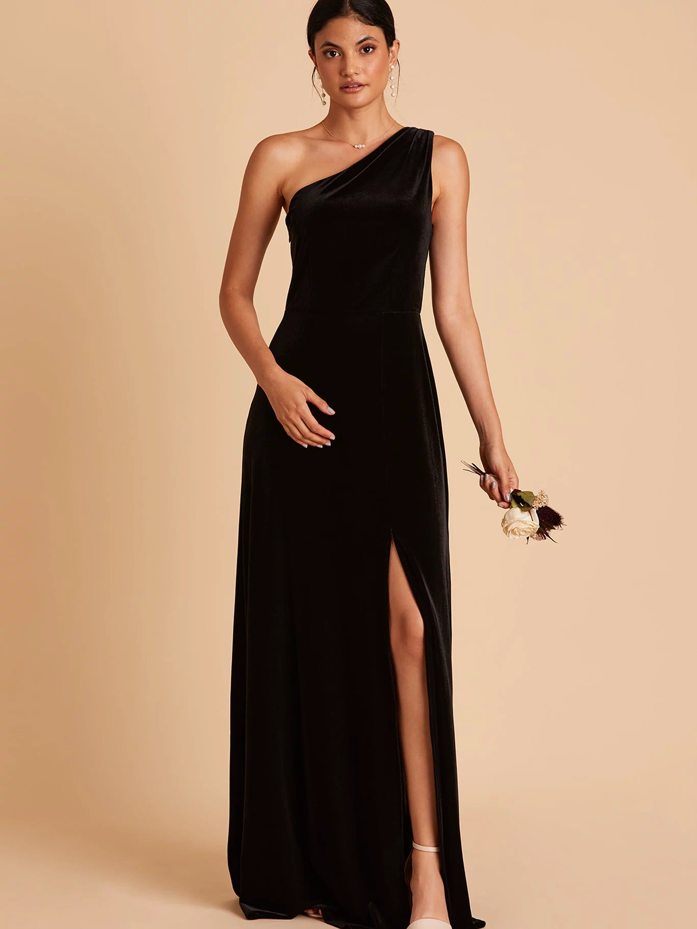 Kira bridesmaid dress with slit in black velvet by Birdy Grey, front view