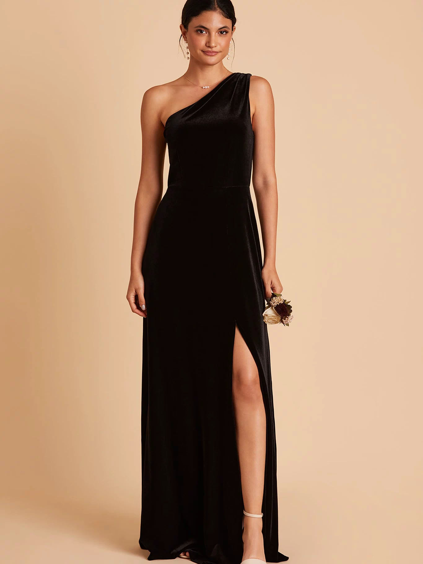 Kira bridesmaid dress with slit in black velvet by Birdy Grey, front view
