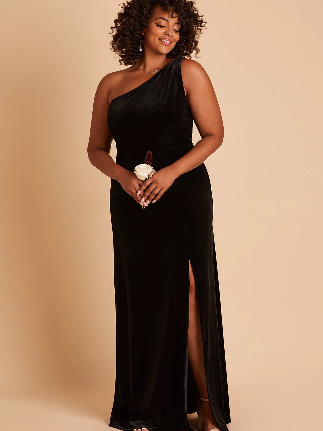 Kira plus size bridesmaid dress with slit in black velvet by Birdy Grey, front view