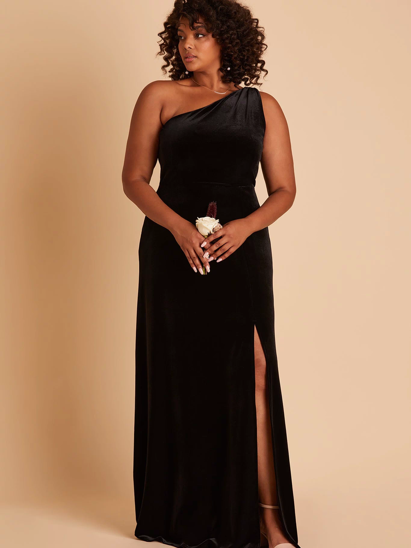 Kira plus size bridesmaid dress with slit in black velvet by Birdy Grey, front view
