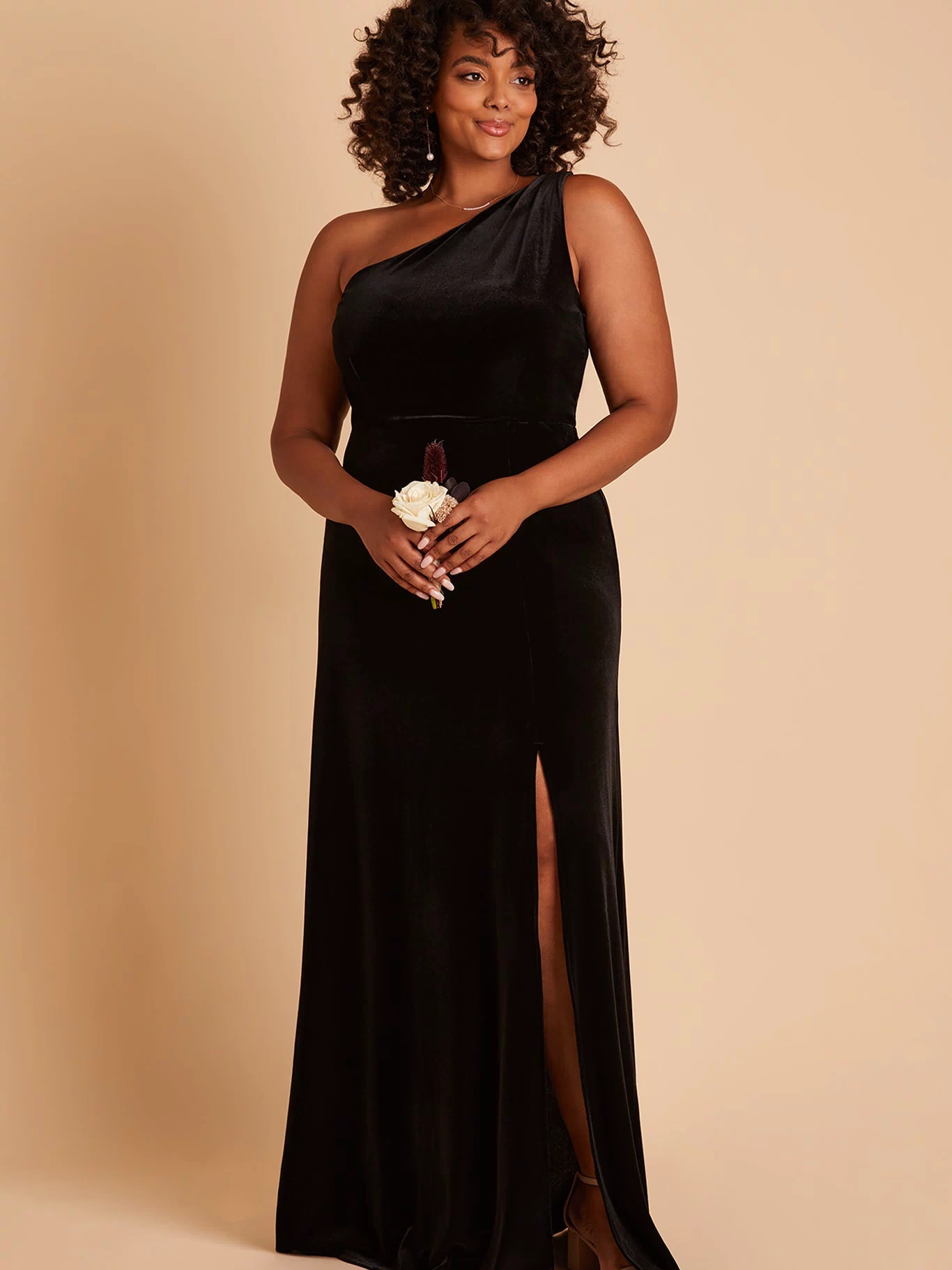 Kira plus size bridesmaid dress with slit in black velvet by Birdy Grey, front view