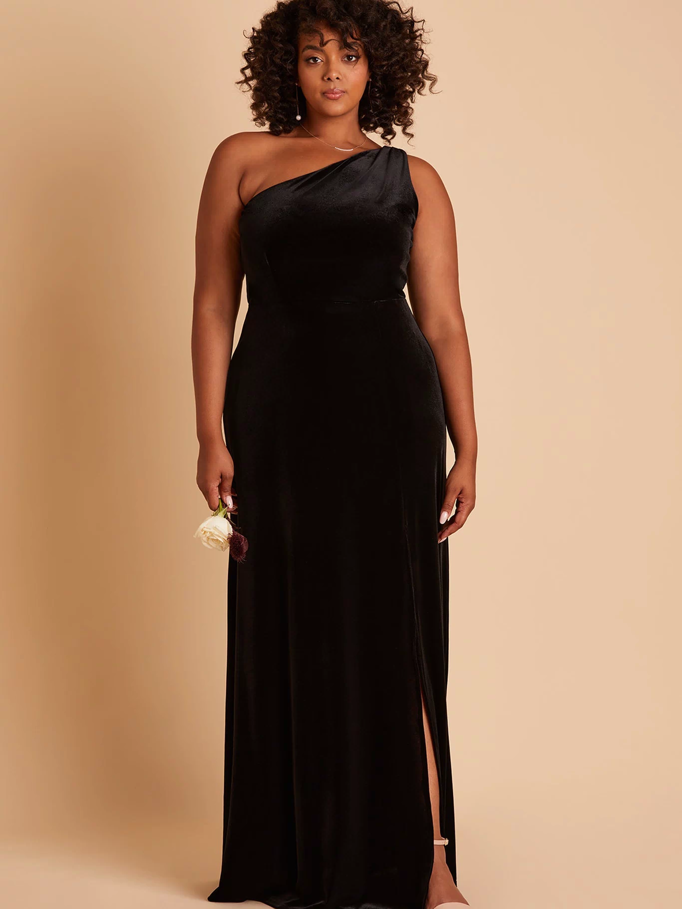 Kira plus size bridesmaid dress with slit in black velvet by Birdy Grey, front view