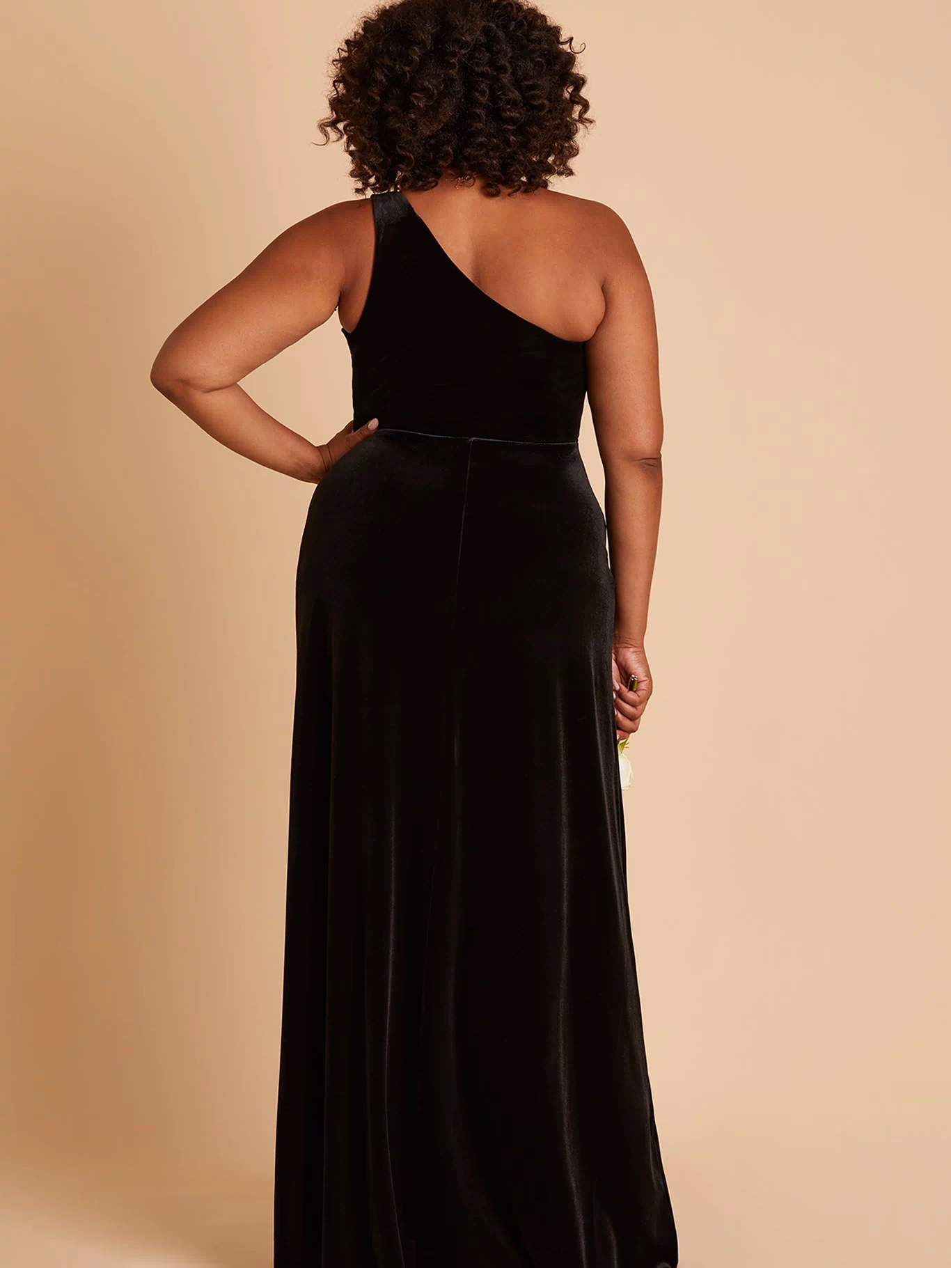 Kira plus size bridesmaid dress with slit in black velvet by Birdy Grey, back view