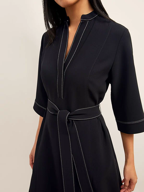 front image of a woman wearing the lauleh dress in black | Exclude 
