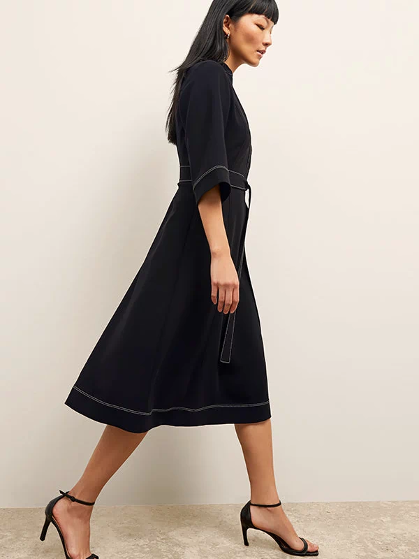 front image of a woman wearing the lauleh dress in black | Exclude