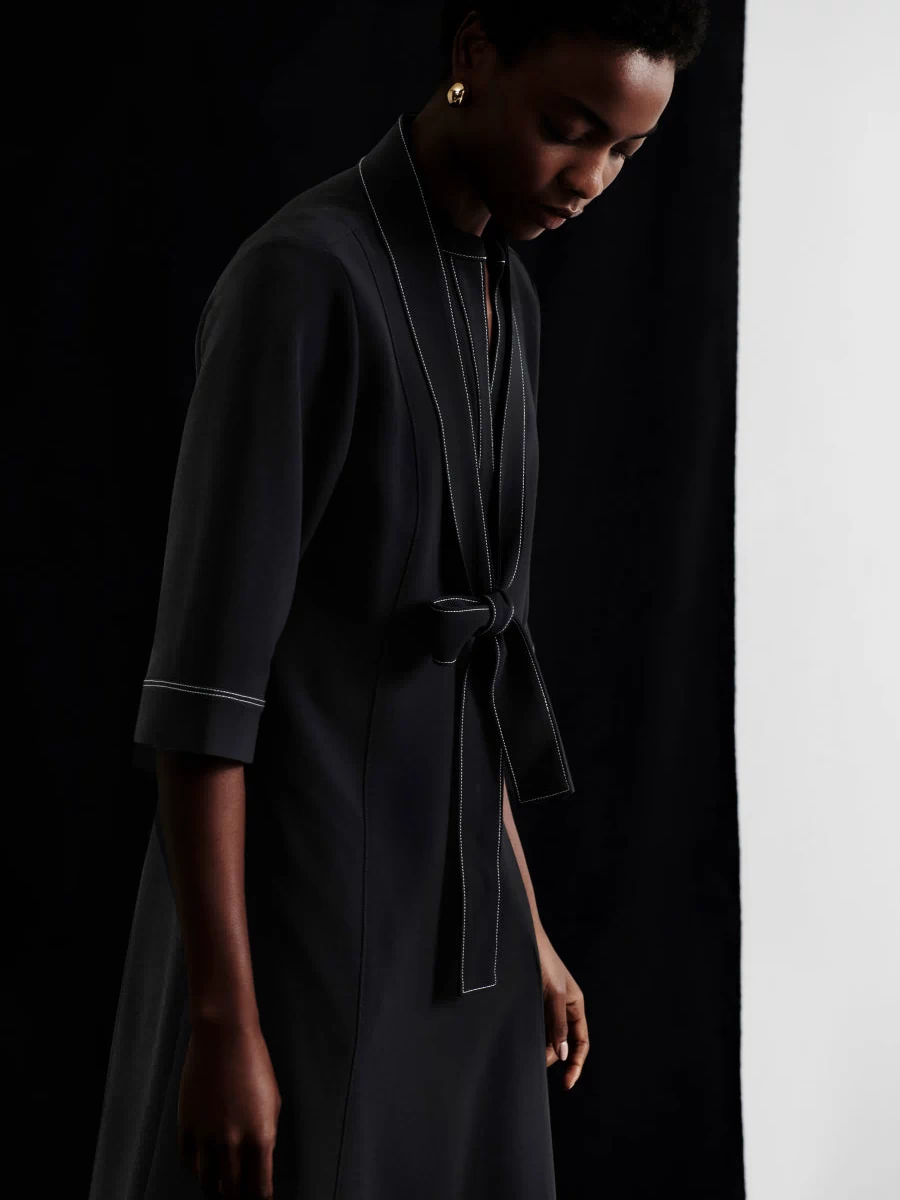 front image of a woman wearing the lauleh dress in black | Exclude
