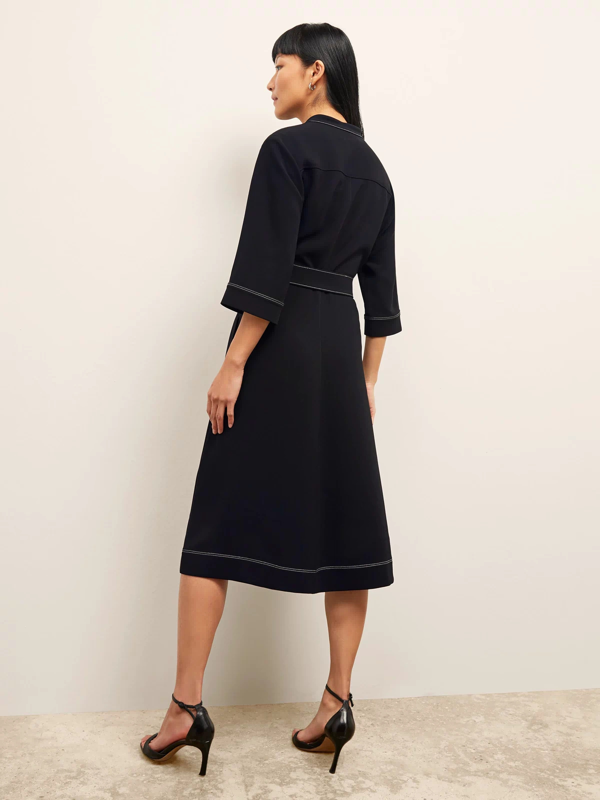 back image of a woman wearing the lauleh dress in black | Exclude