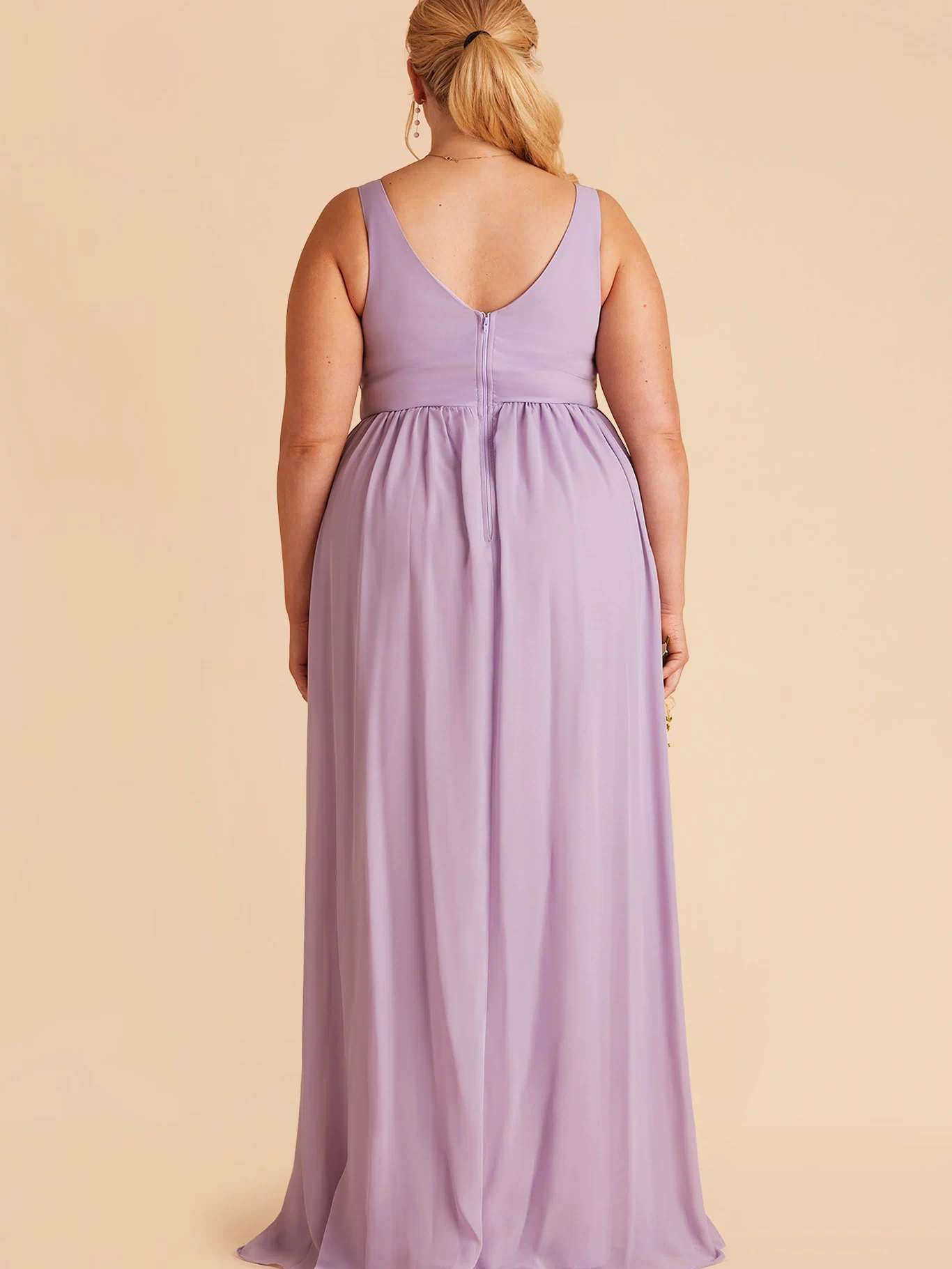 Laurie Empire plus size maternity bridesmaid dress with slit in lavender by Birdy Grey, back view