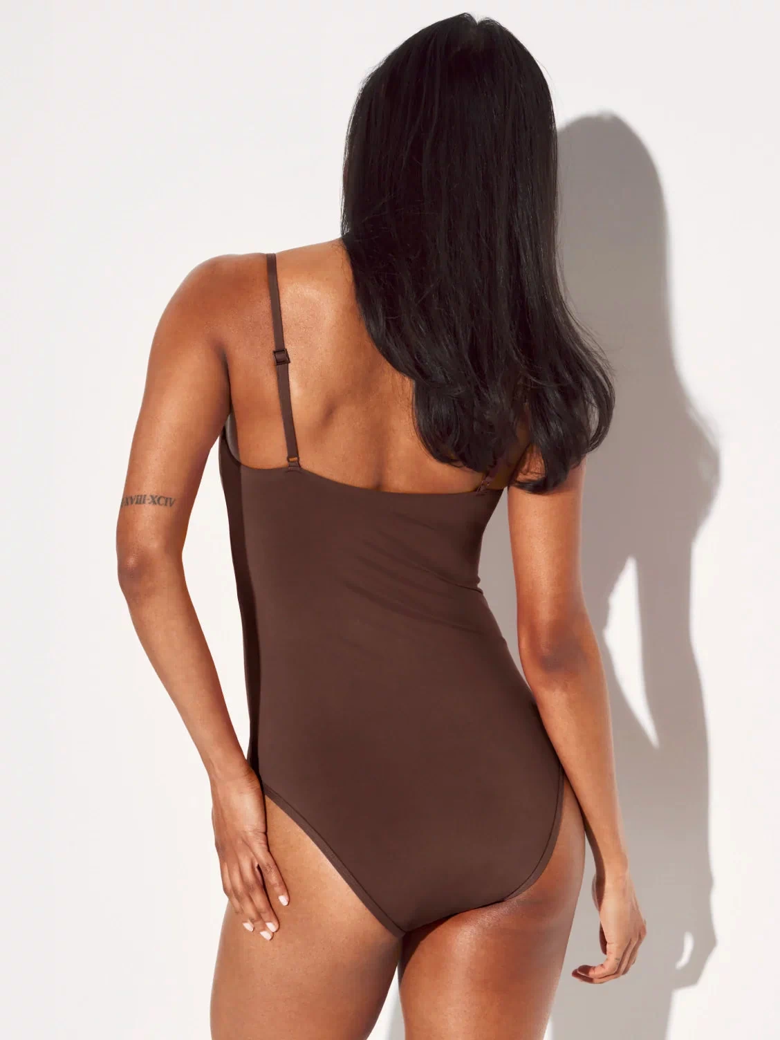  | Back view of model wearing the Leakproof Sculpt Classic One Piece Swimsuit highlighting the neckline, coverage and fit | Espresso