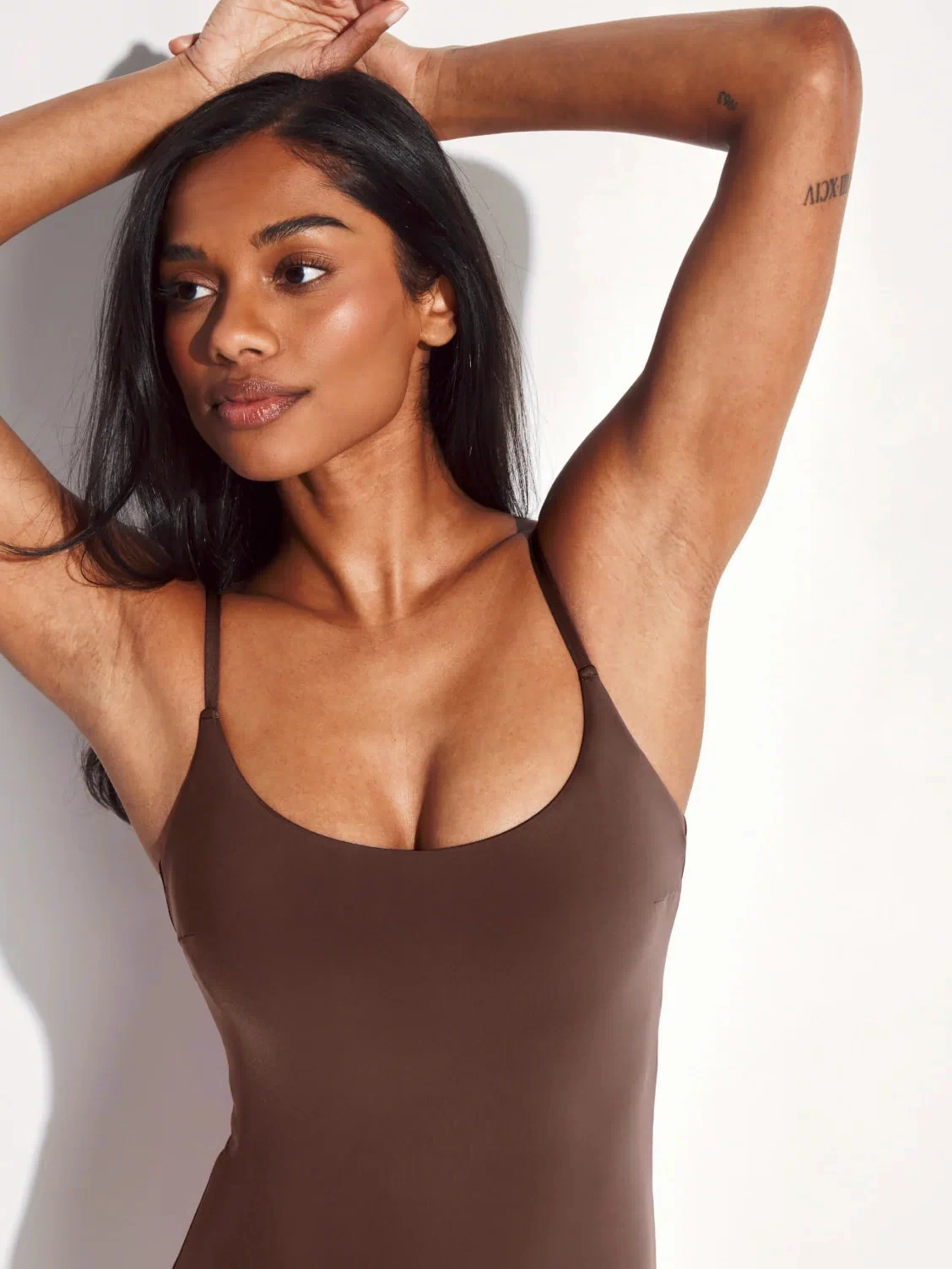  | Front view of model wearing the Leakproof Sculpt Classic One Piece Swimsuit highlighting the neckline, coverage and fit | Espresso