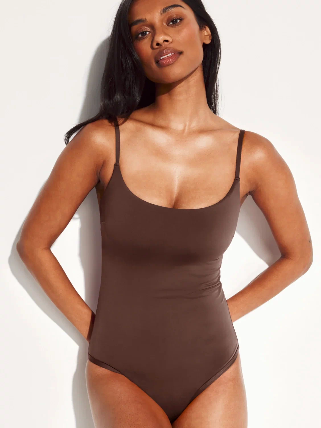  | Front view of model wearing the Leakproof Sculpt Classic One Piece Swimsuit highlighting the neckline, coverage and fit | Espresso