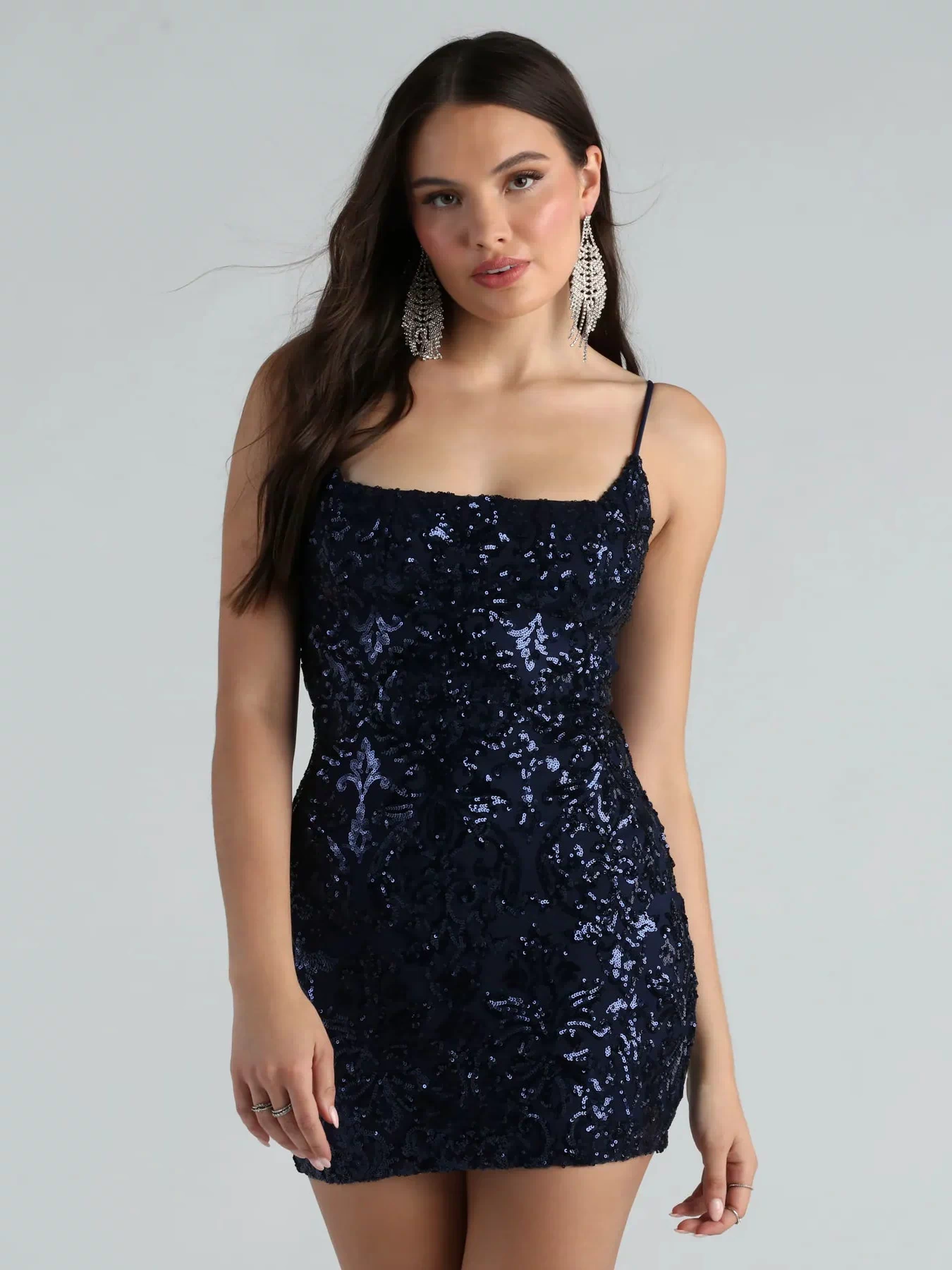 Shimmer through every feed refresh in the Leila Sequin Bodycon Mini Dress, a viral-worthy look from Windsor's navy blue prom dresses that nails bold, confident energy.