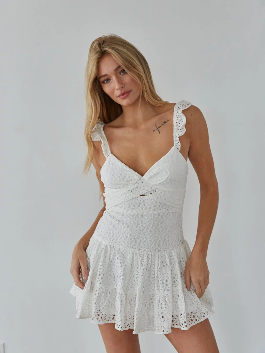 white lace bow back romper - white ruffle sleeve mini dress - unique graduation dress 2024