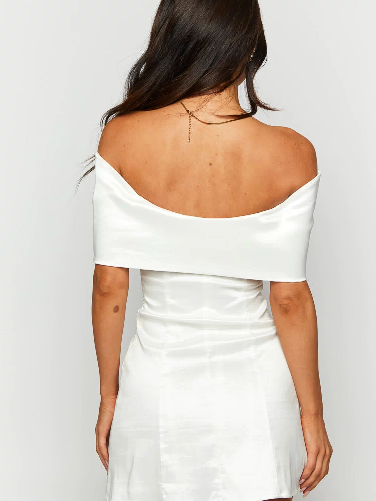 Rear view of a white satin off-shoulder mini dress with a wide folded neckline and fitted bodice