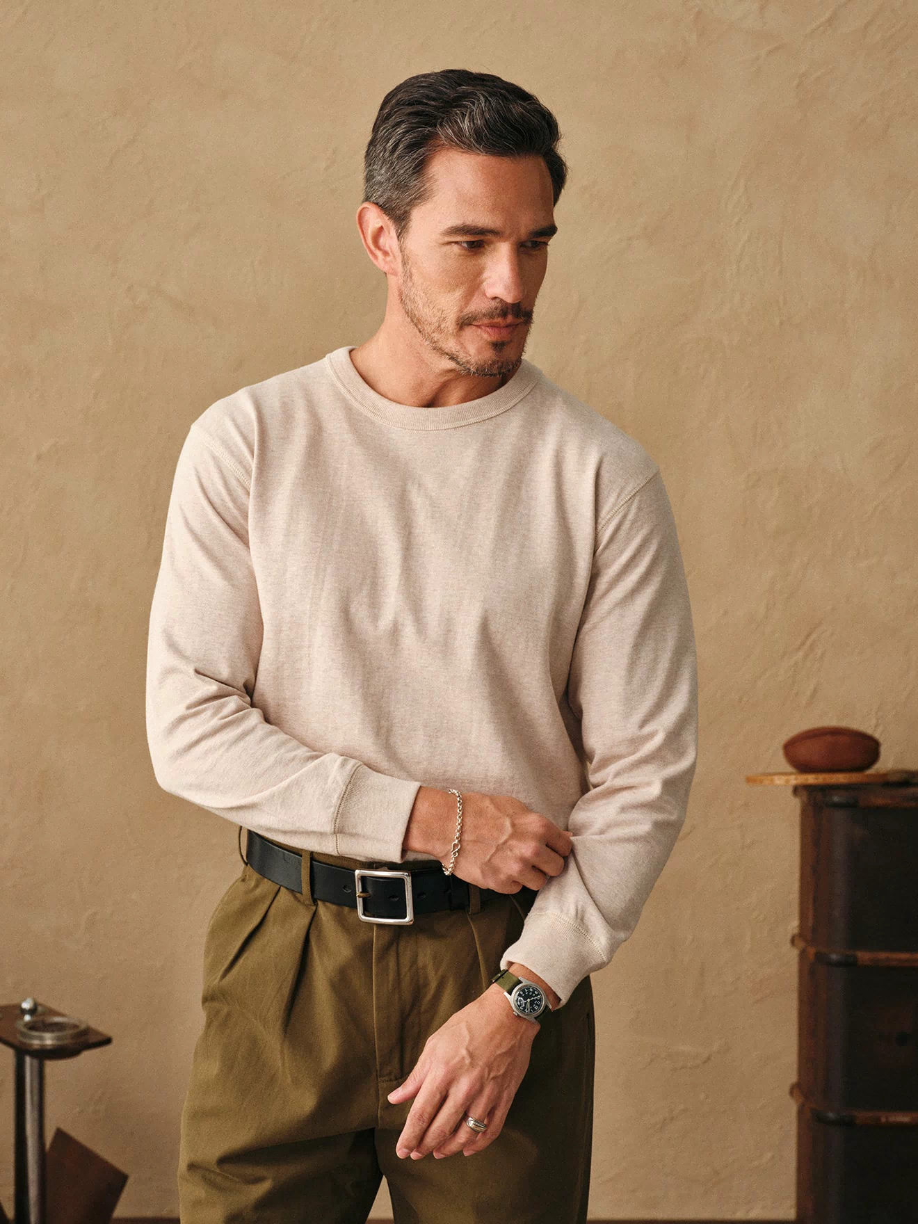 Oatmeal long-sleeve cotton t-shirt on model, long sleeves and crew neck