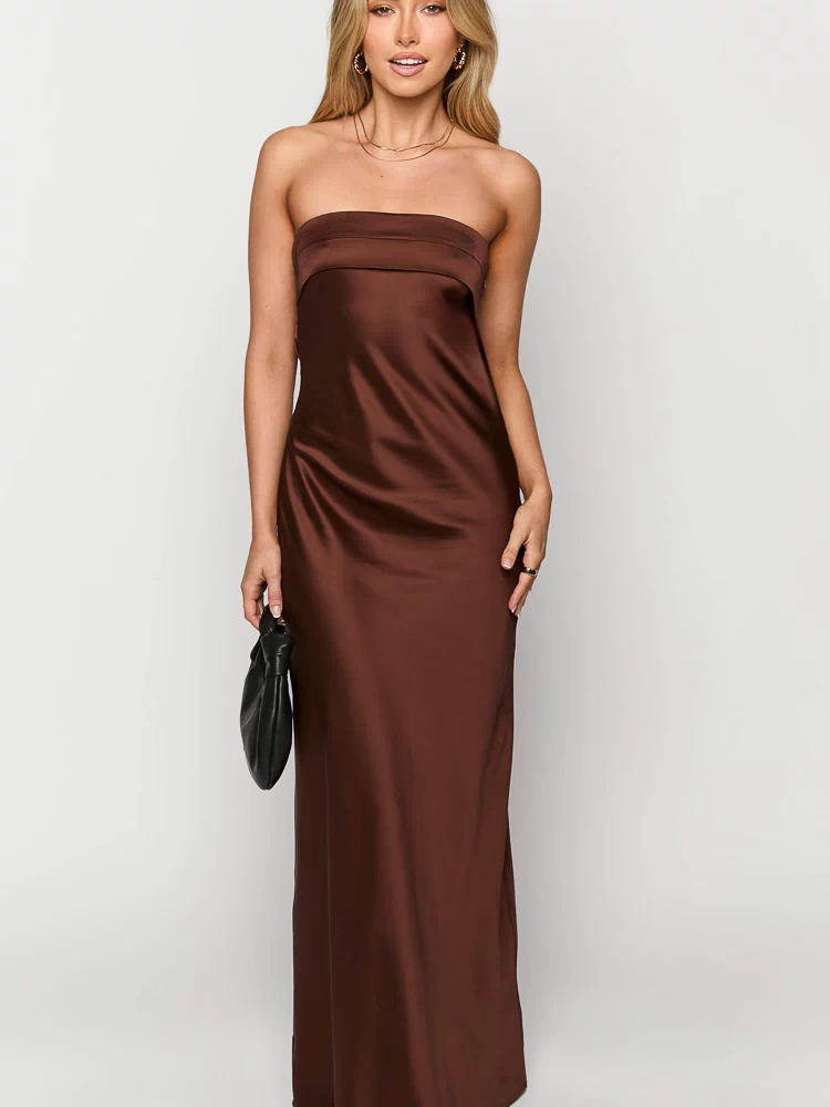 Front view of a brown strapless satin maxi dress with a fitted bodice and flowing skirt