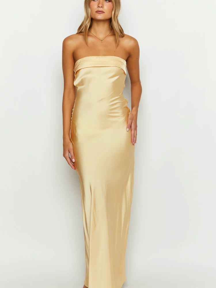 Front view of a yellow satin strapless maxi dress with a folded-over bust detail