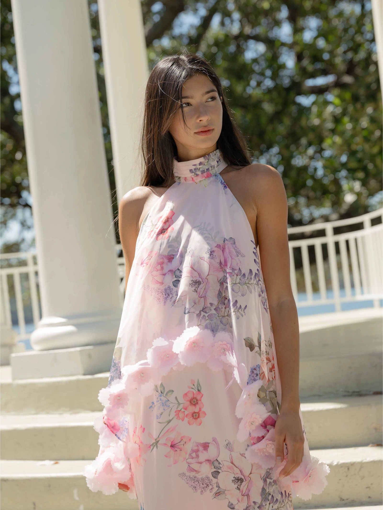 Brunette model wearing the Millie Tiered Gown in Pink Floral content shot