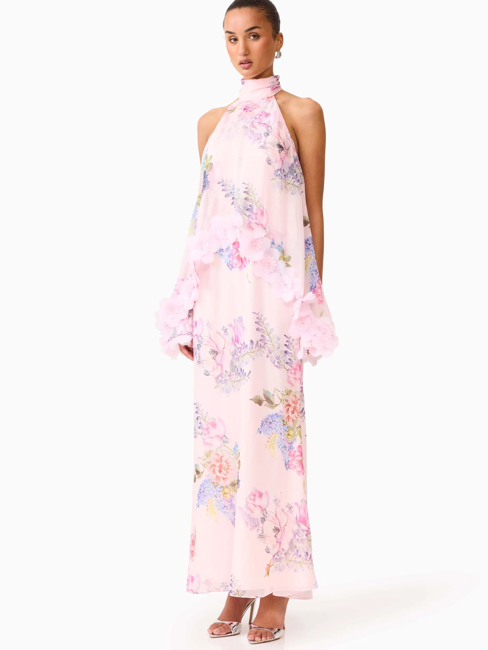 Brunette model wearing the Millie Tiered Gown in Pink Floral side shot 
