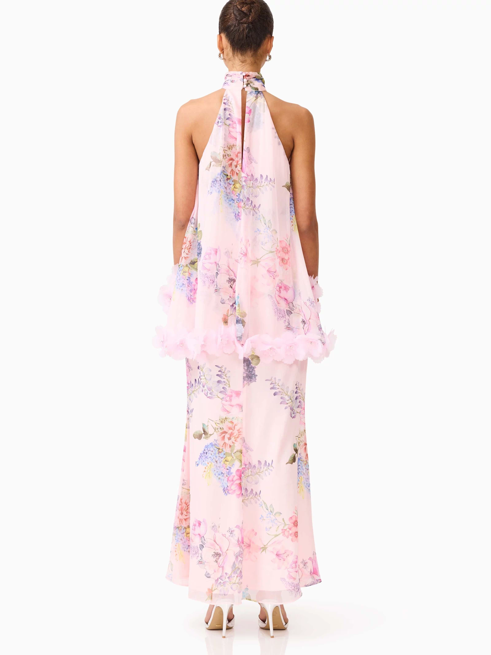 Brunette model wearing the Millie Tiered Gown in Pink Floral back shot 
