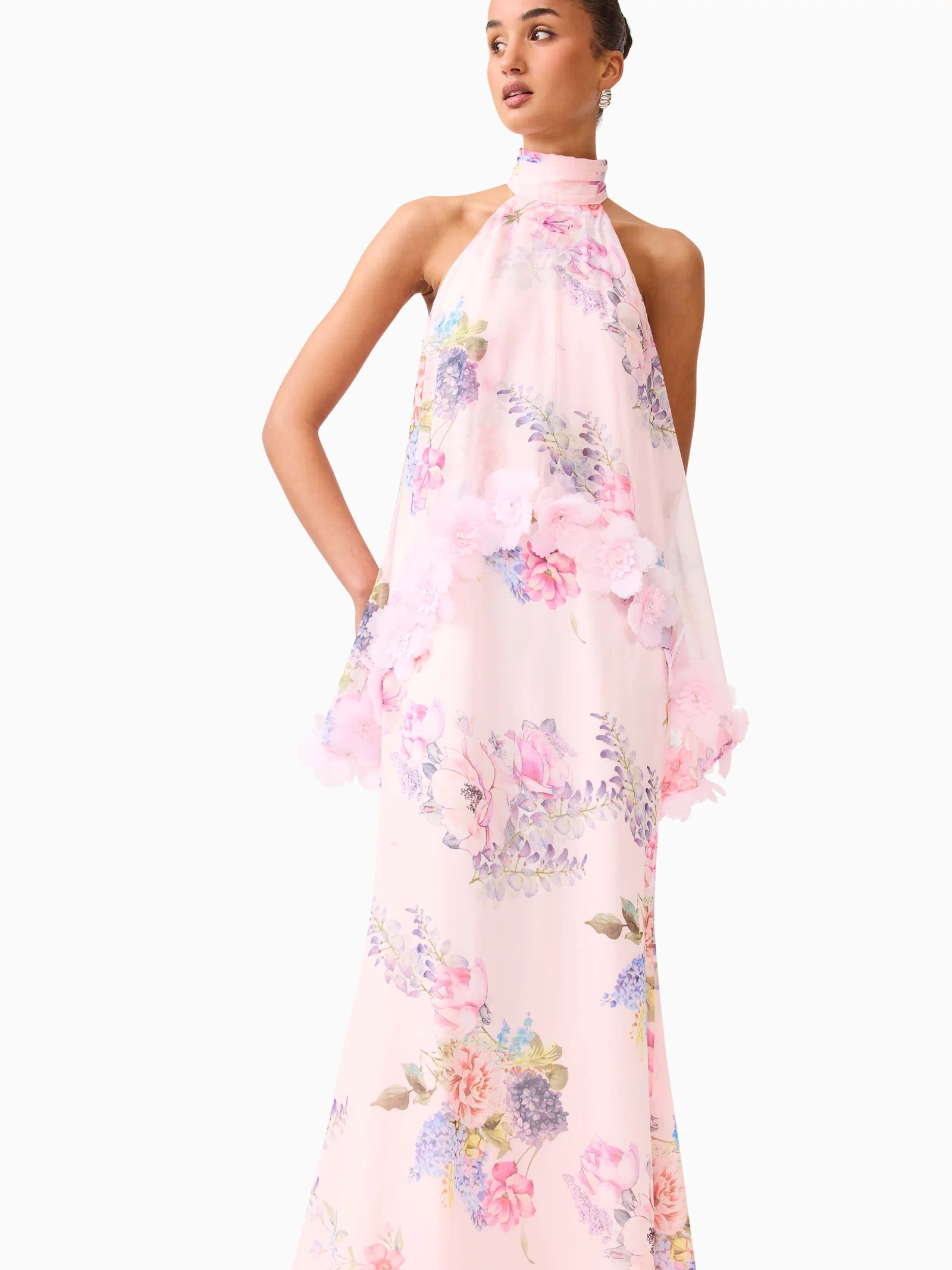 Brunette model wearing the Millie Tiered Gown in Pink Floral posed close up shot 
