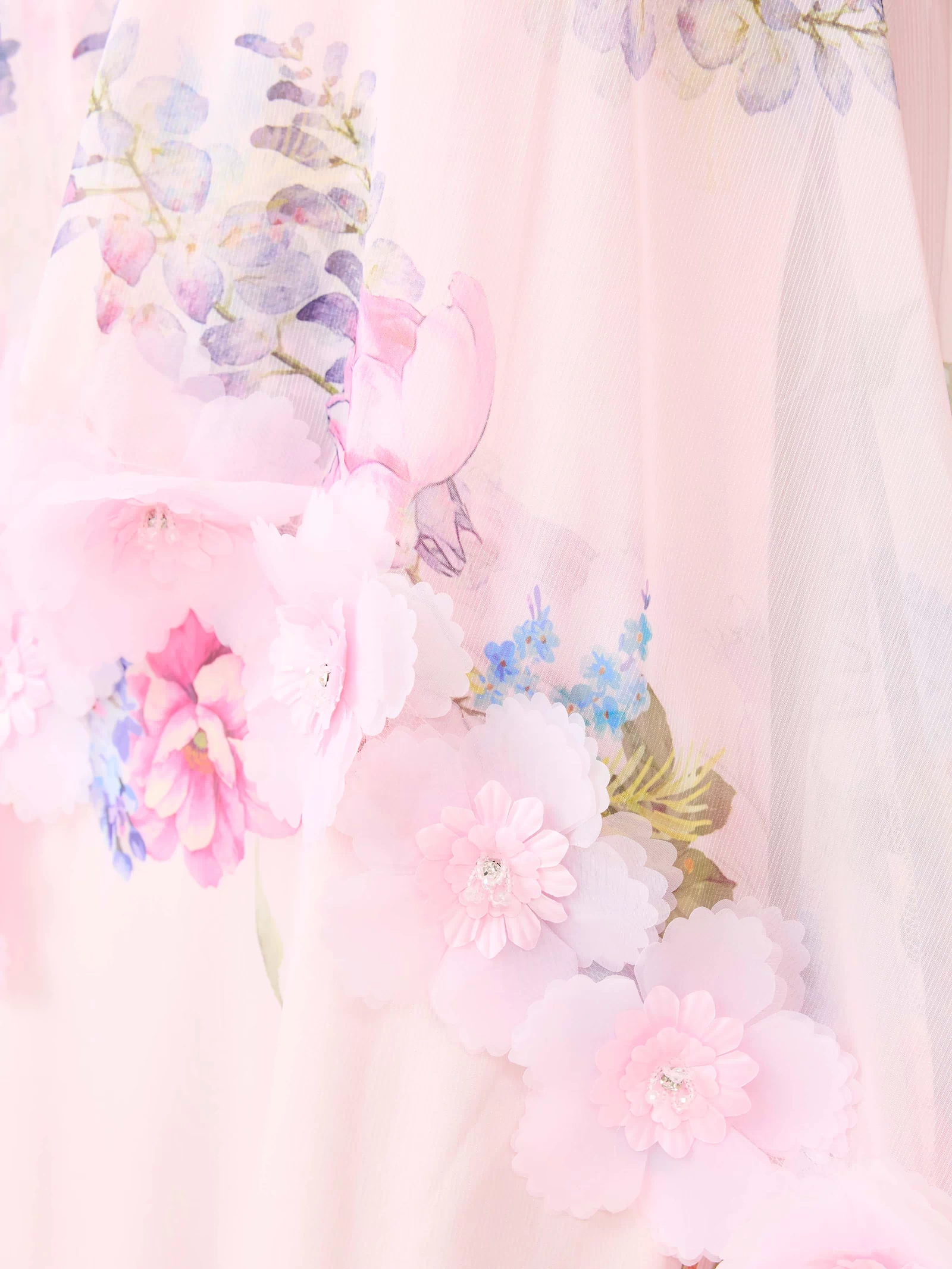 Brunette model wearing the Millie Tiered Gown in Pink Floral detail shot 
